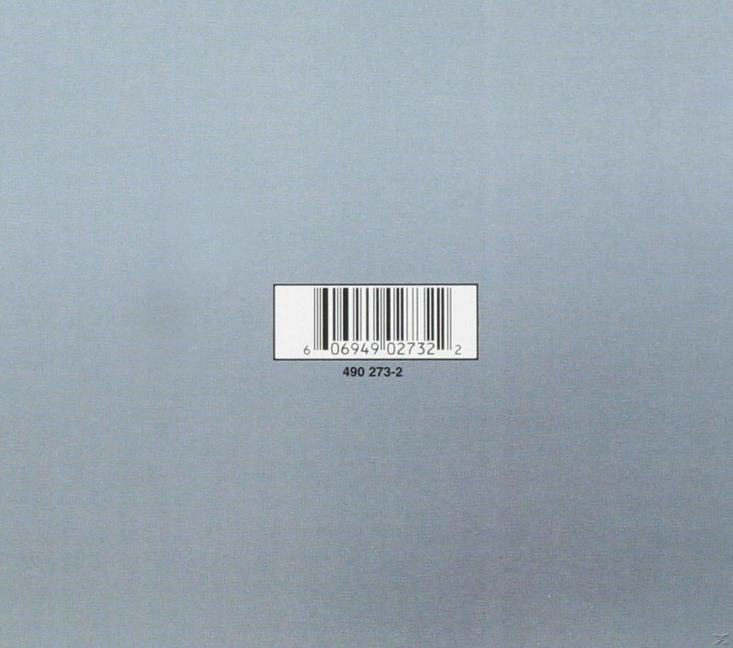 Retro copertina dell'album grigia con codice a barre e testo '06949 02732 2'.