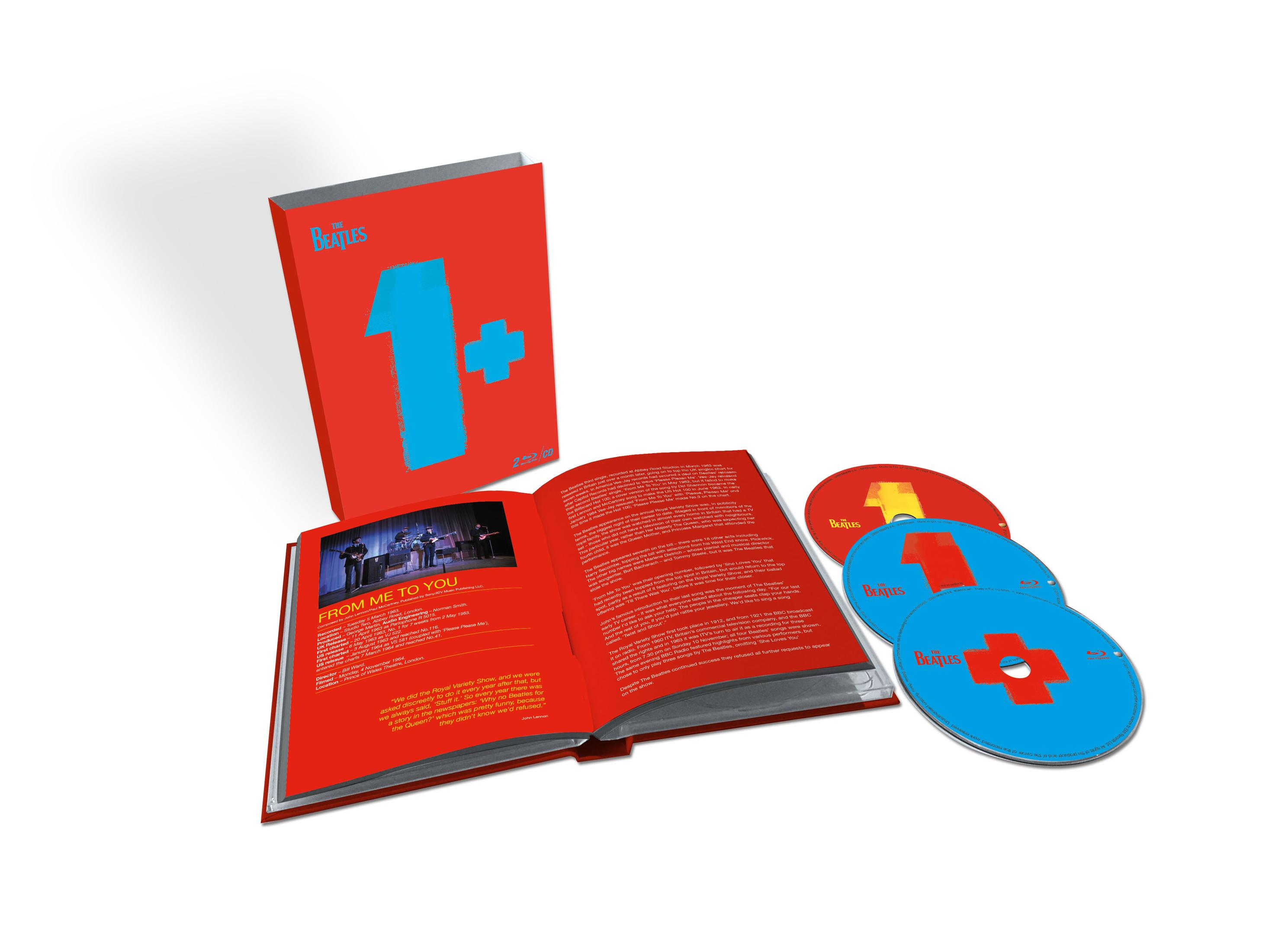 Album The Beatles '1+' z okładką i płytami CD w czerwonym etui.