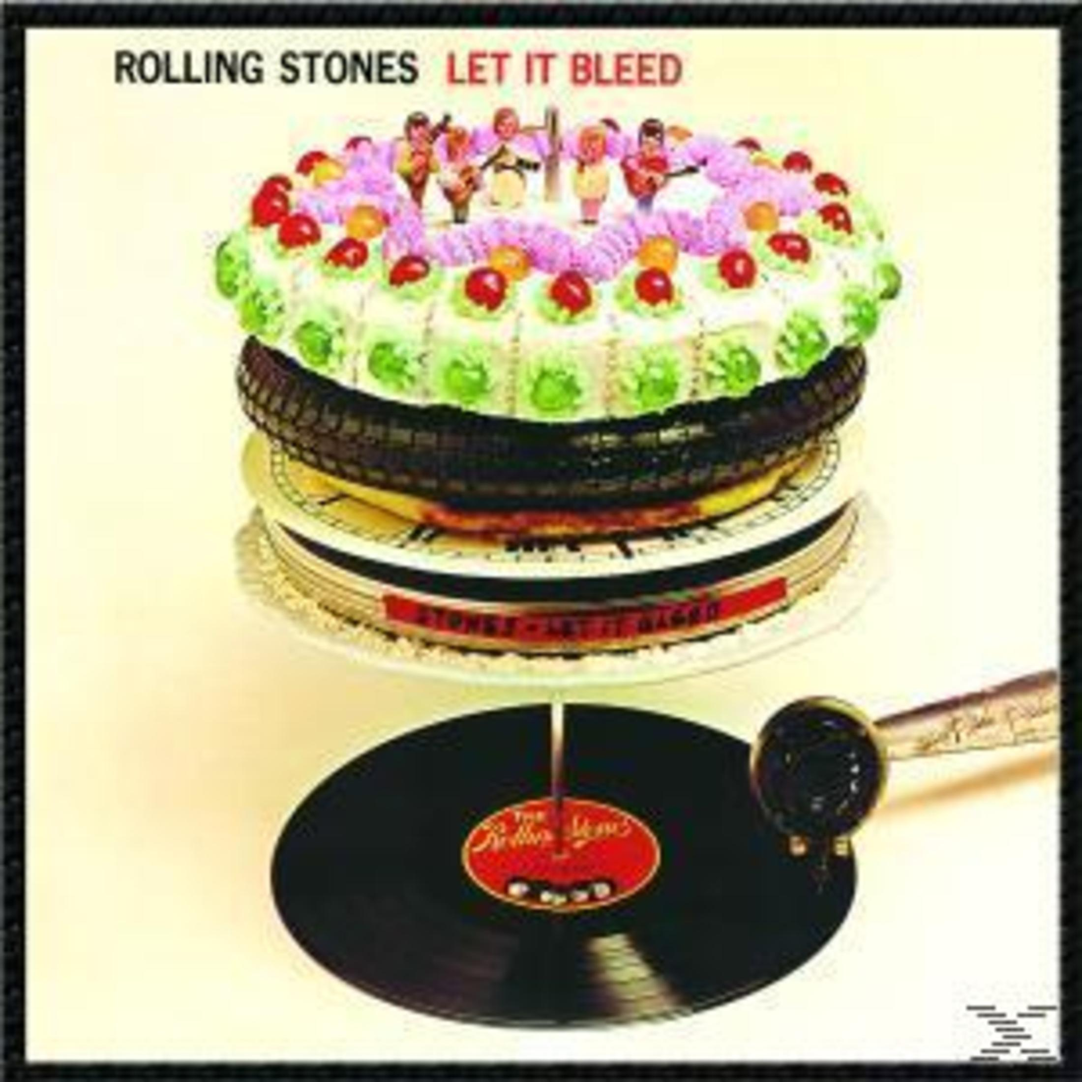 Copertina dell'album con torta, disco e telefono.