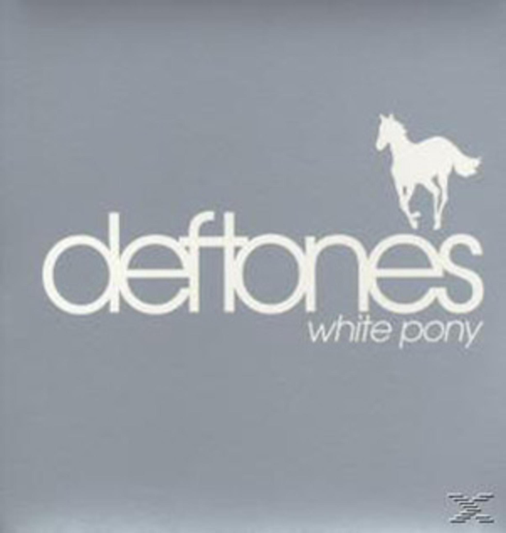 Copertina dell'album dei Deftones, testo bianco su sfondo grigio e un pony bianco.