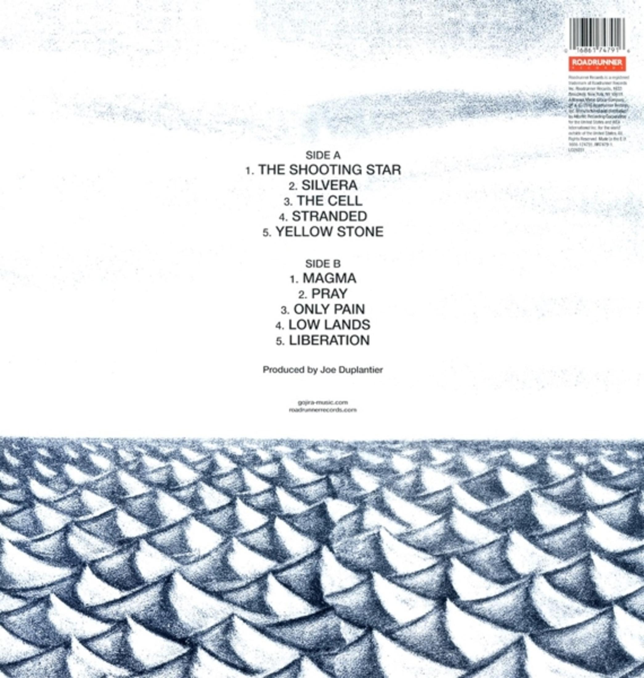 Retro copertina dell'album: Elenco canzoni su bianco, con un motivo a squame di pesce blu in basso.