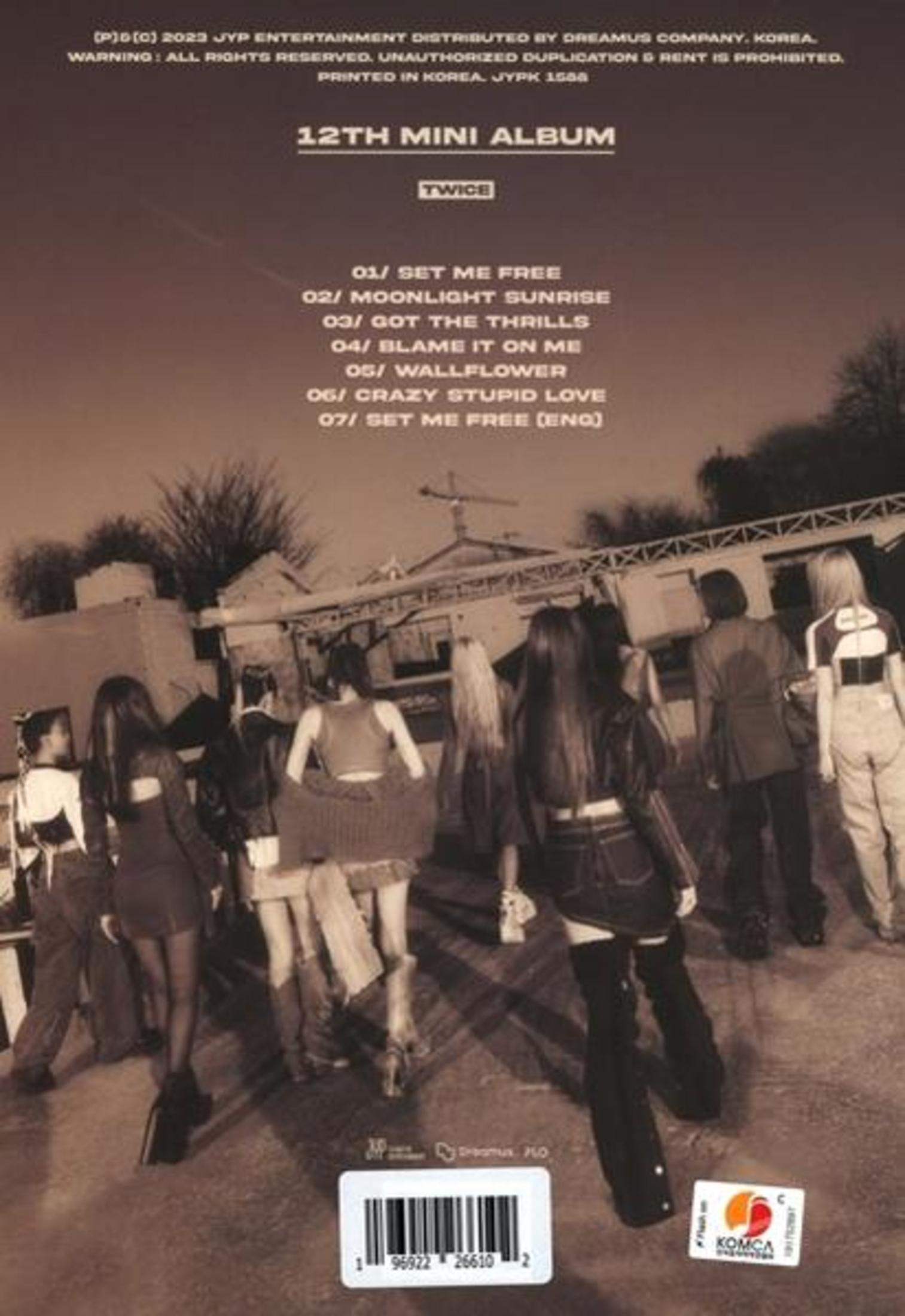 Back of album with list of songs and a group of people walking away.