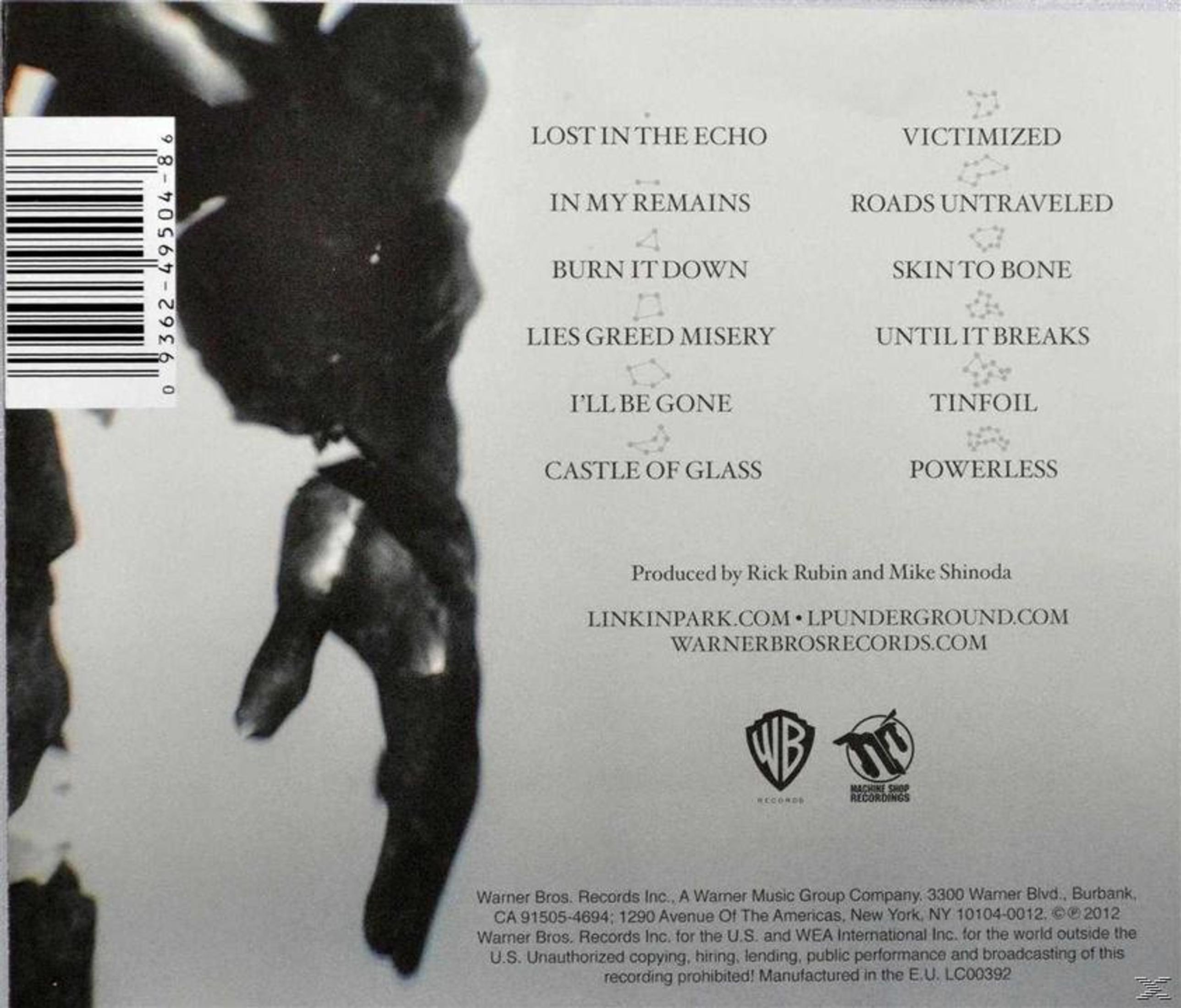 Album-Rückseite mit Titelliste. Schwarz-Weiß-Foto, Text auf der Seite. Warner Bros Records-Logo.