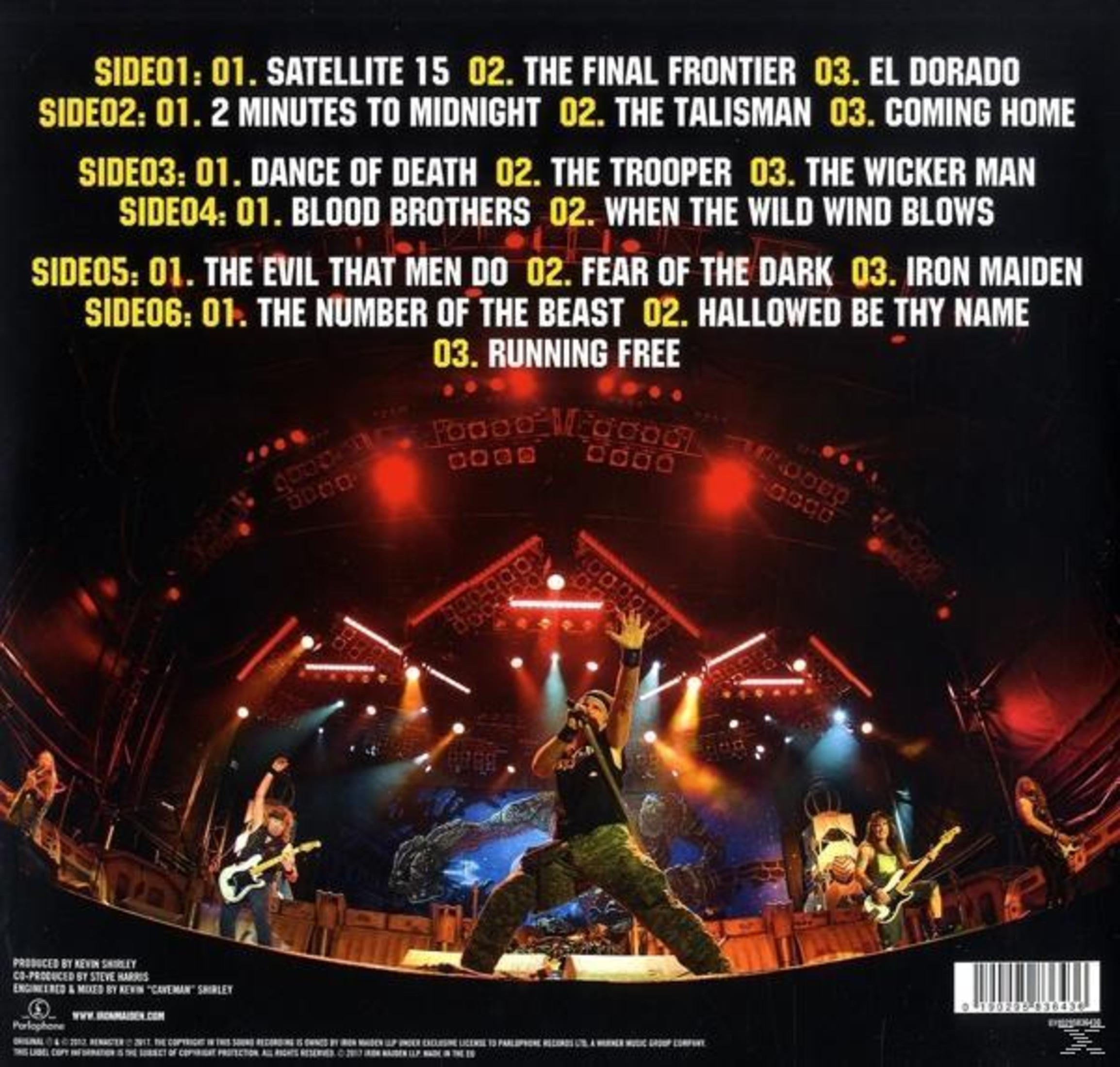 Copertina dell'album Iron Maiden con scena di concerto.