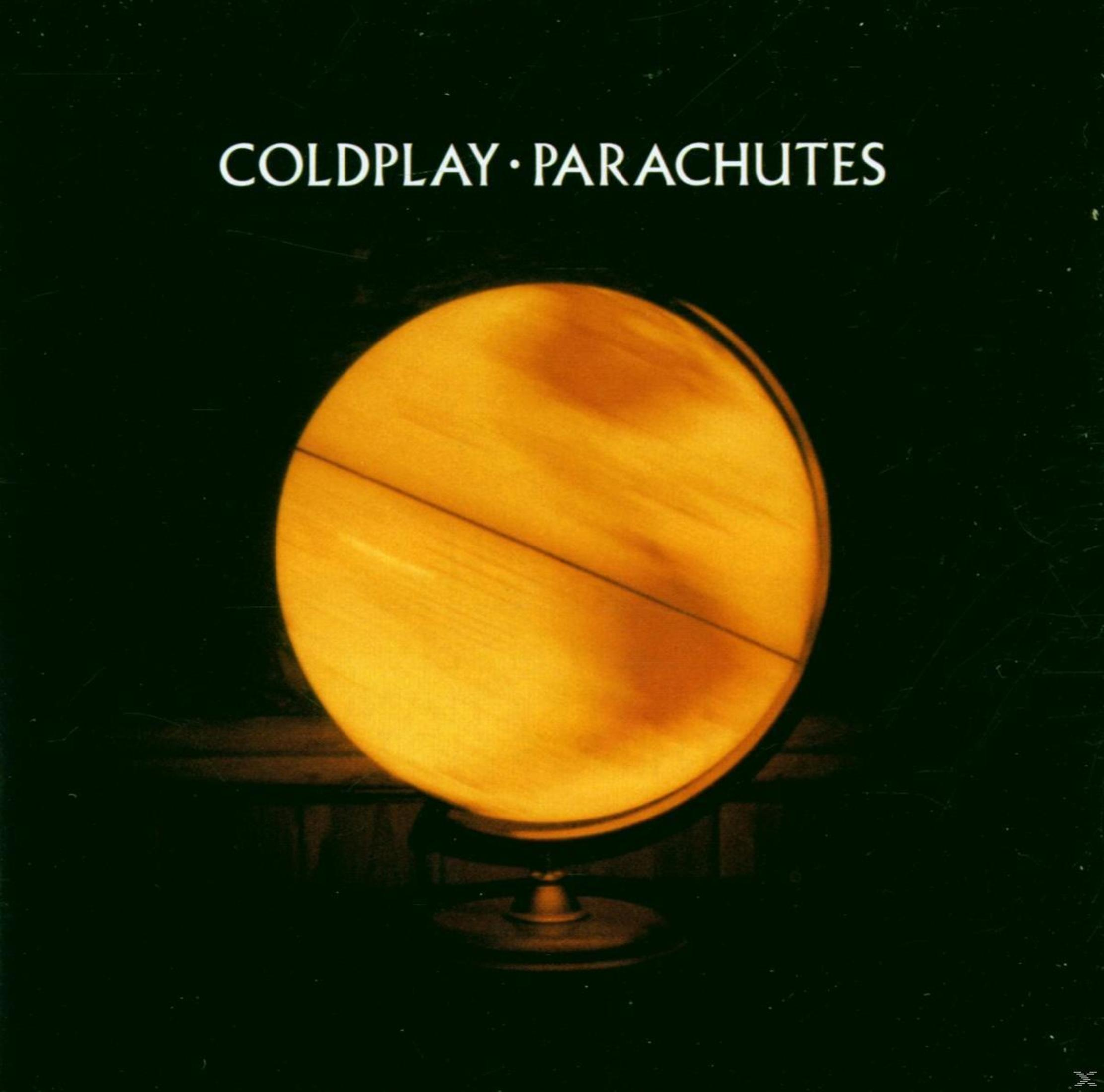 Copertina dell'album dei Coldplay. Un globo giallo su un supporto su sfondo scuro. Titolo dell'album in alto.