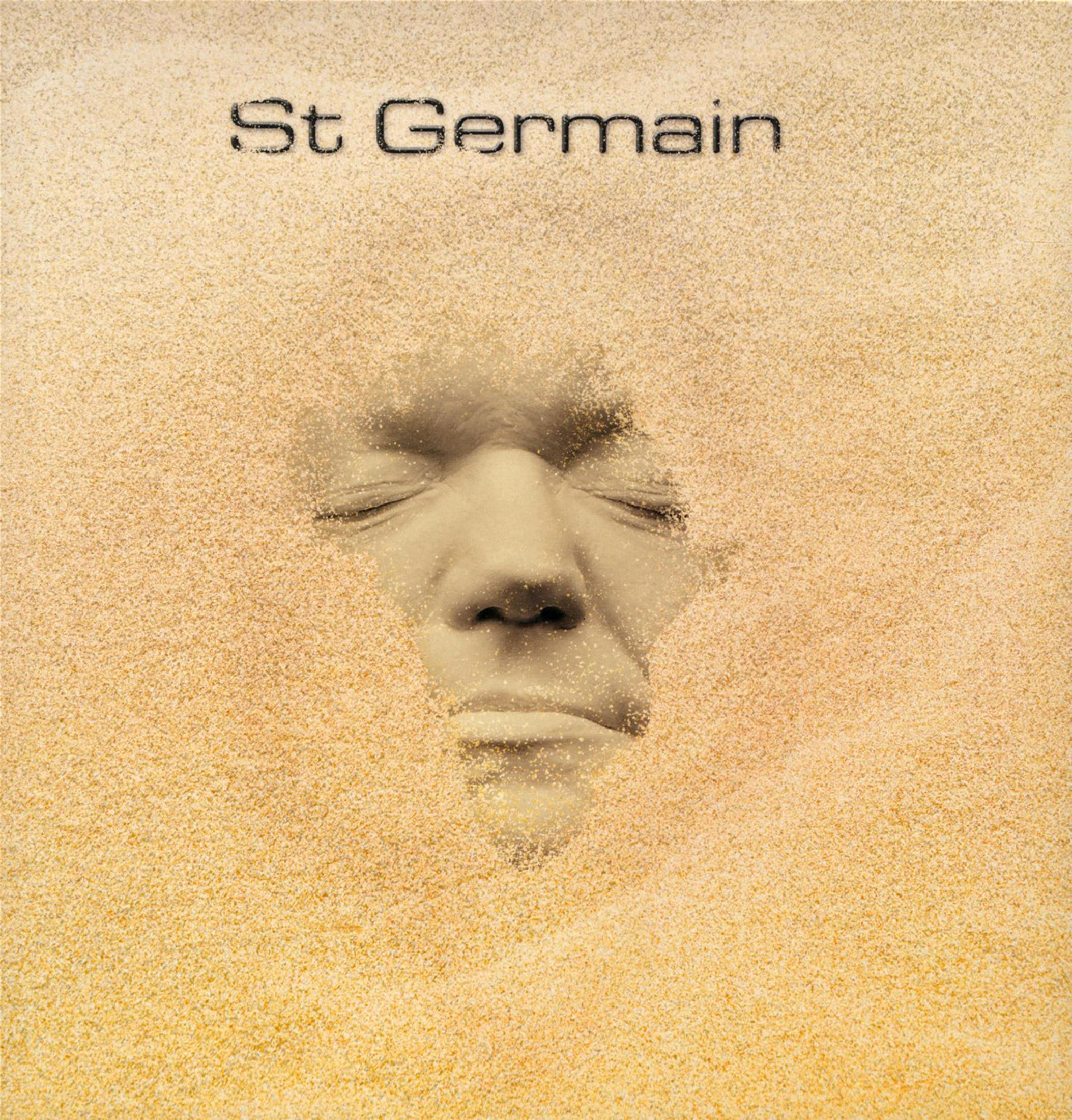 Portada del álbum: Rostro enterrado en arena, con el texto 'St Germain' encima del rostro.
