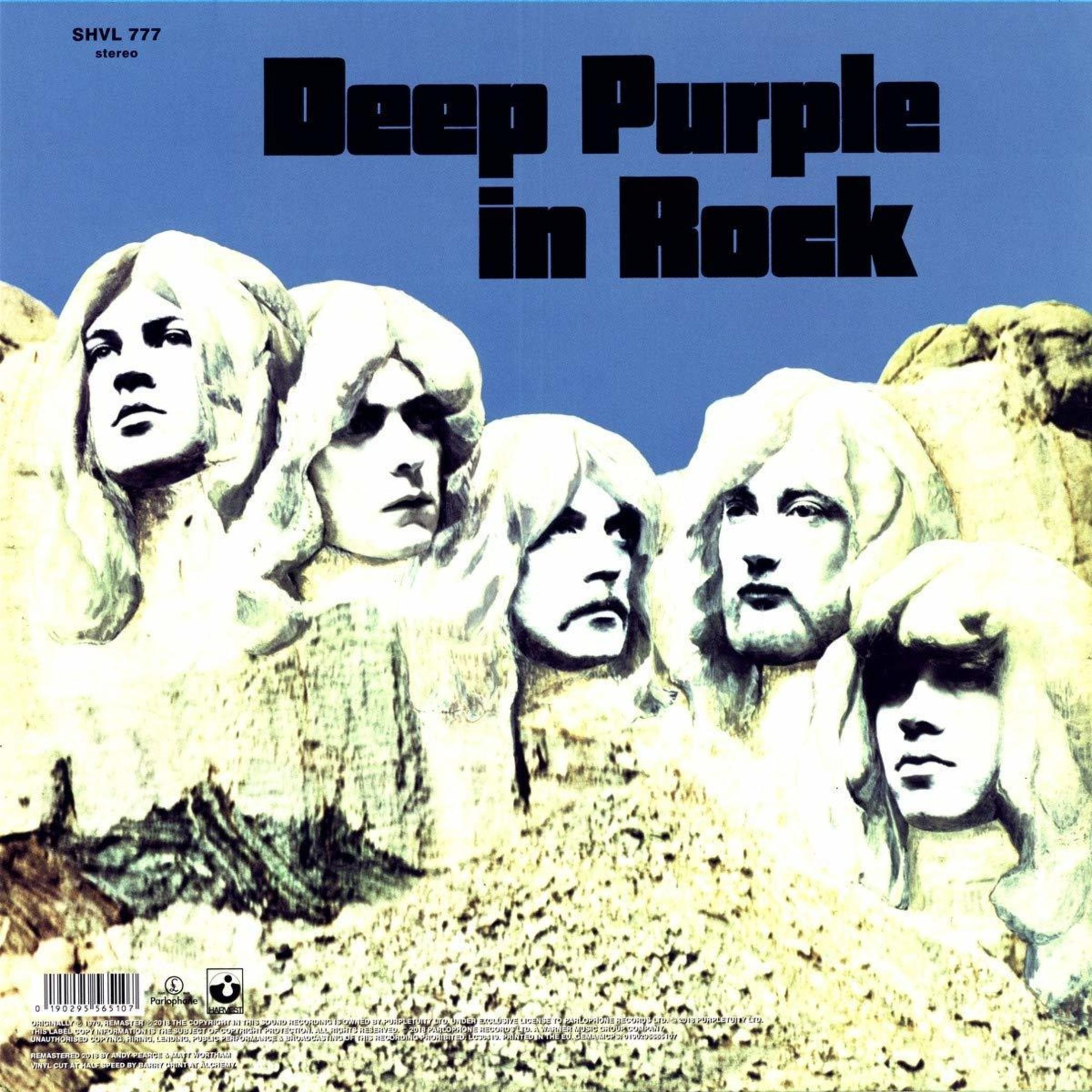 Copertina dell'album Deep Purple in Rock. Cinque volti scolpiti nella pietra. Sfondo cielo blu. Testo in alto.