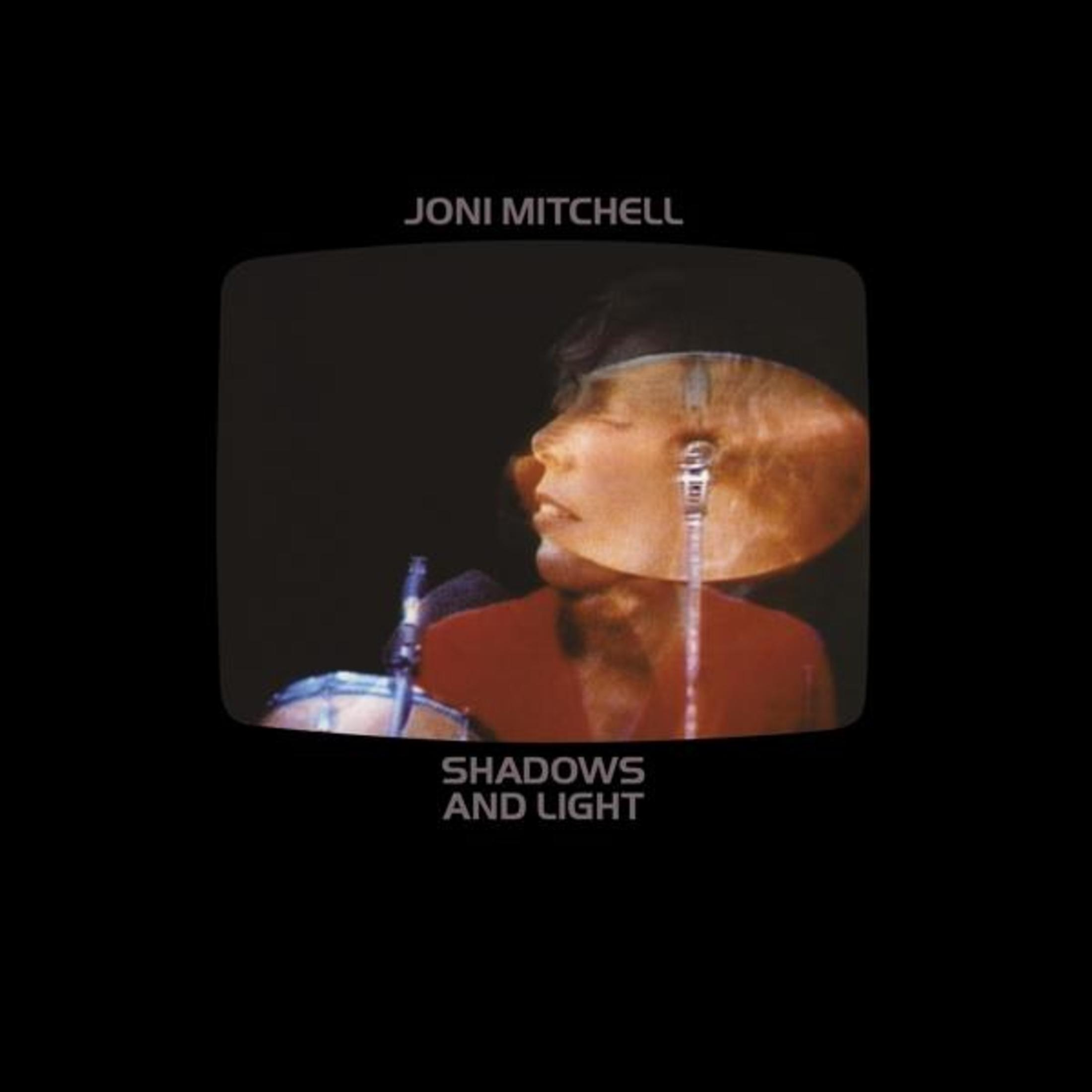 Copertina dell'album con Joni Mitchell, un profilo con un piatto e il titolo "Shadows and Light".