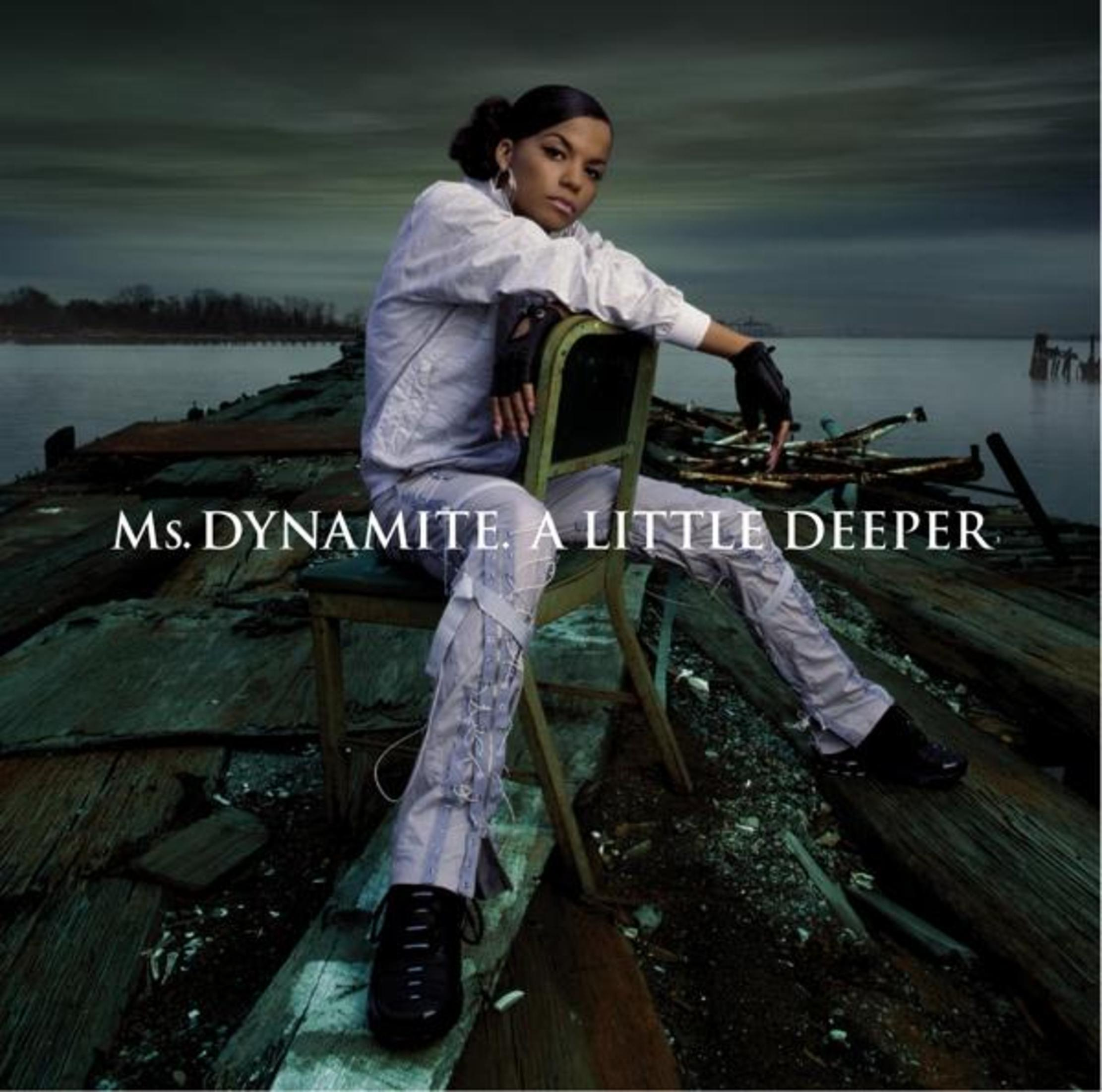 Copertina dell'album: Ms. Dynamite su una sedia, guarda la fotocamera. Titolo: A Little Deeper.