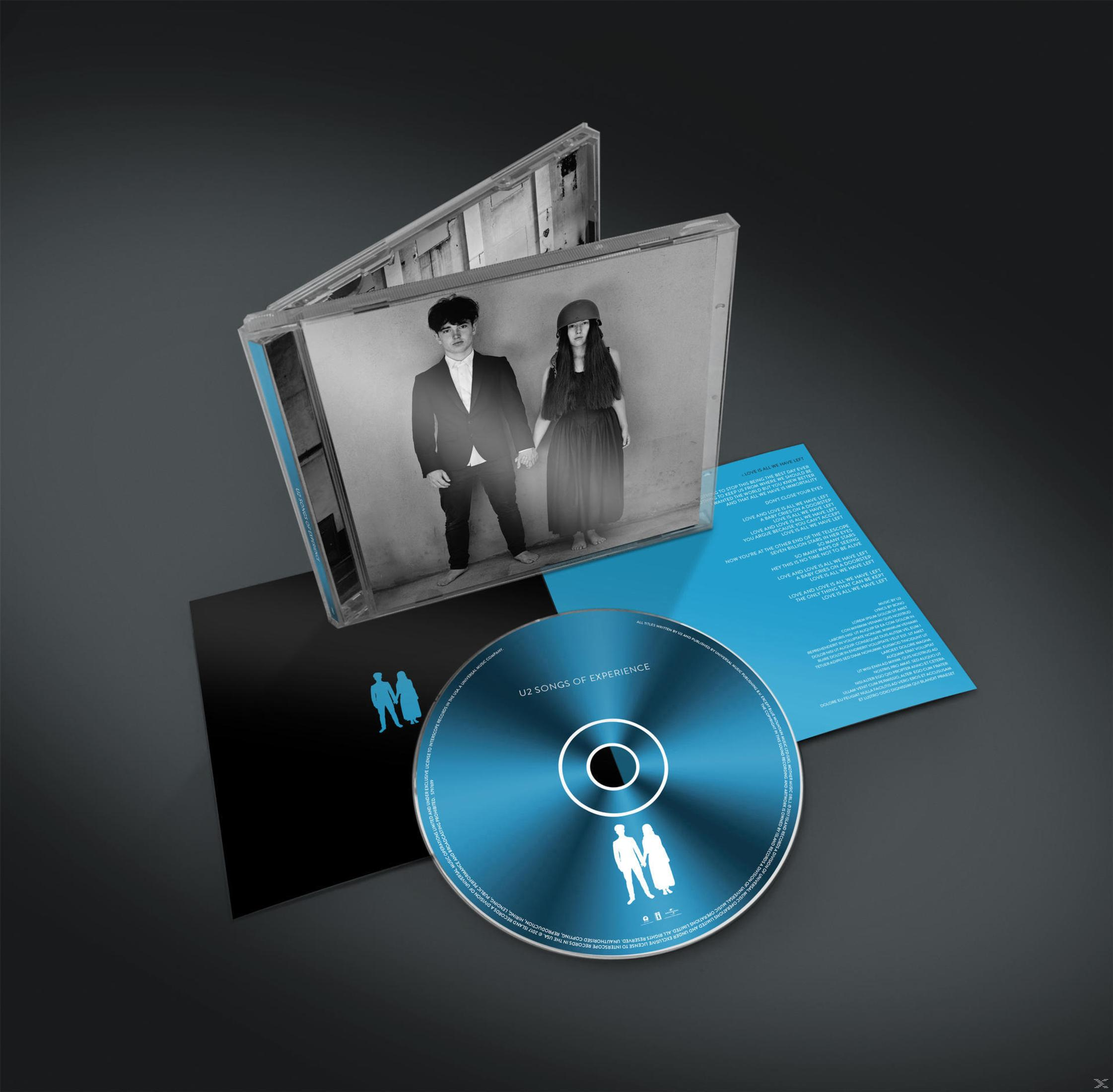 Copertina dell'album: Custodia del CD con una foto di una coppia che si tiene per mano. CD blu con logo.