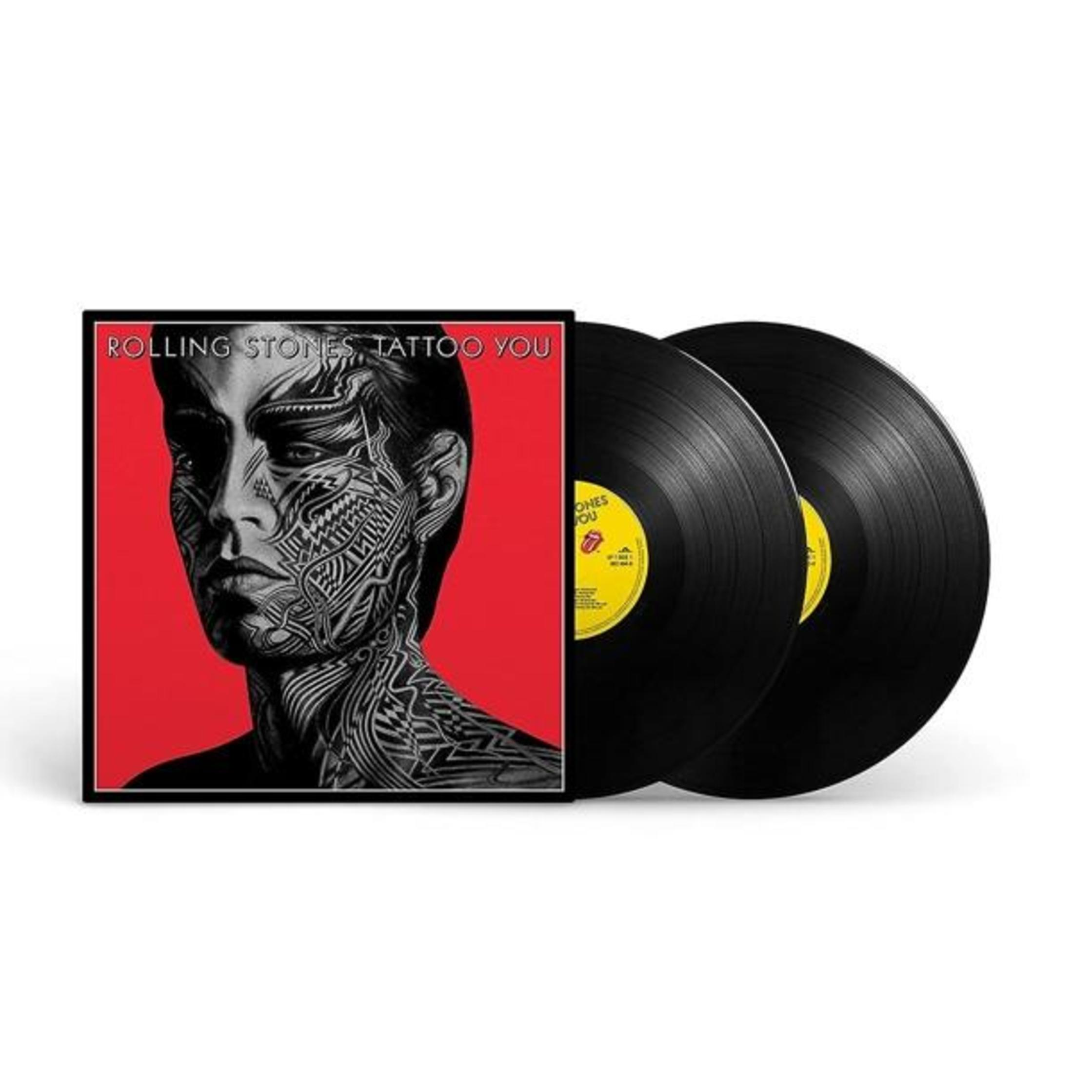Copertina album: Volto tatuato, titolo 'Tattoo You' e due vinili.