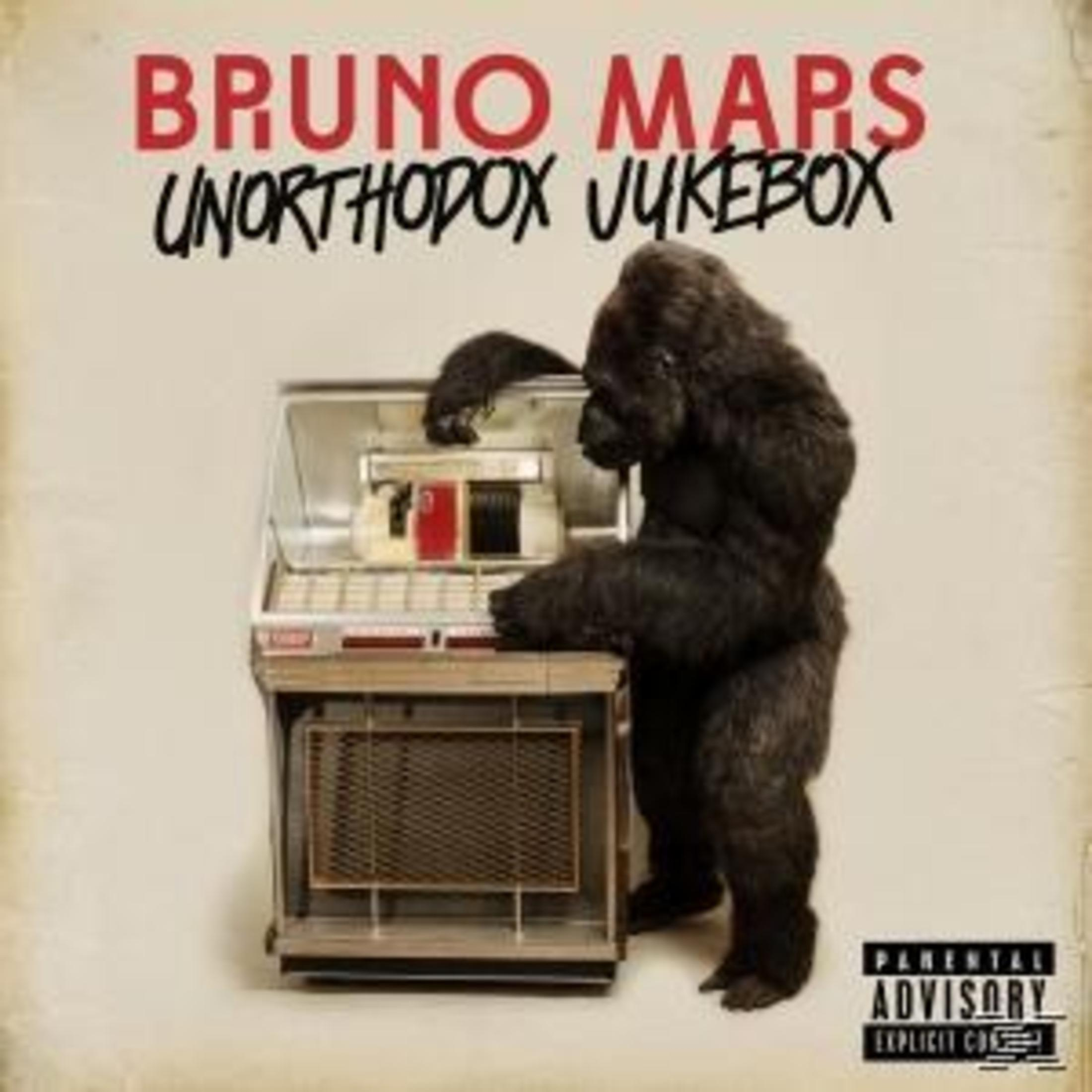Albumhoes van Bruno Mars met een gorilla die een jukebox bedient. Het album heet 'Unorthodox Jukebox'.