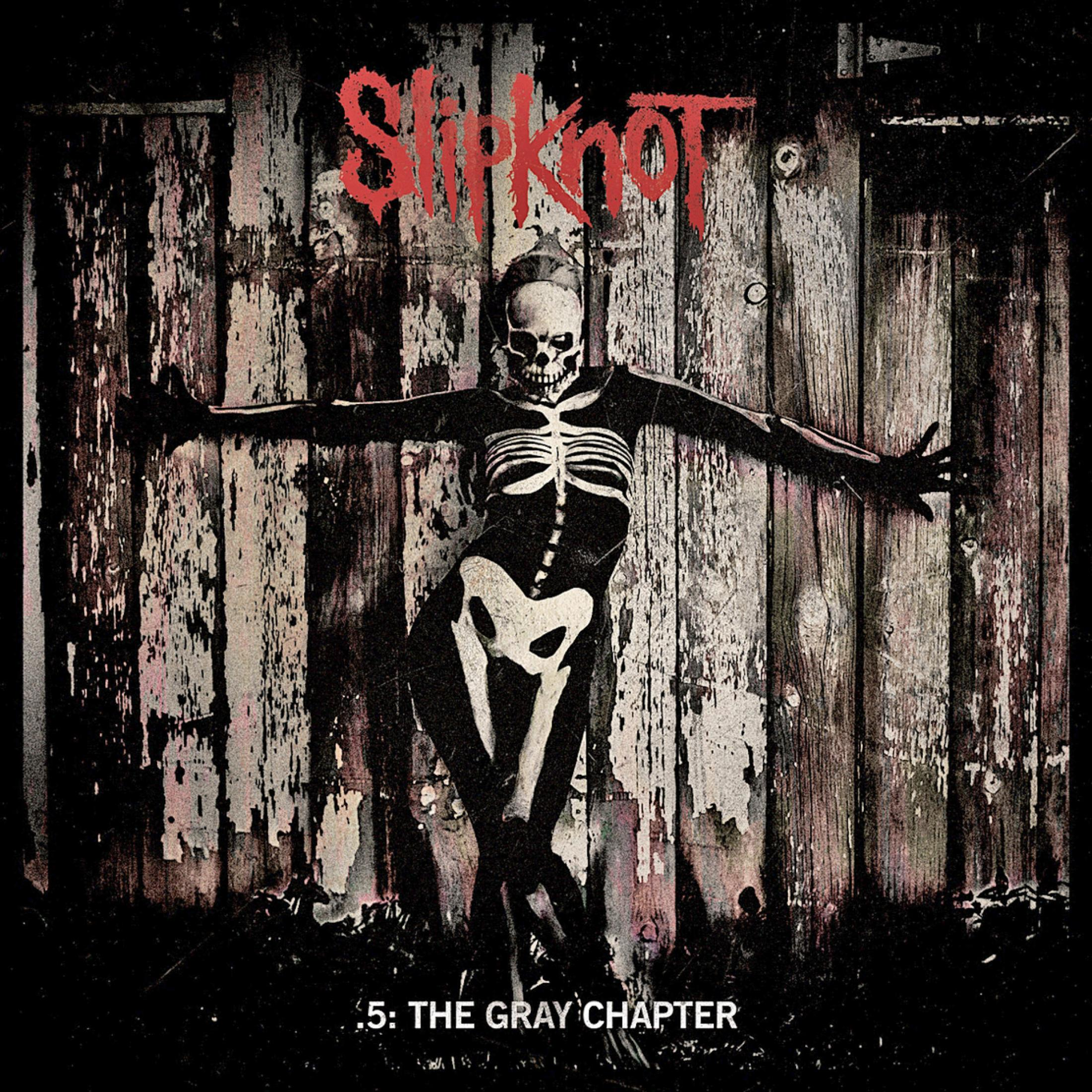 Copertina dell'album Slipknot: una persona scheletro di fronte a una staccionata di legno.