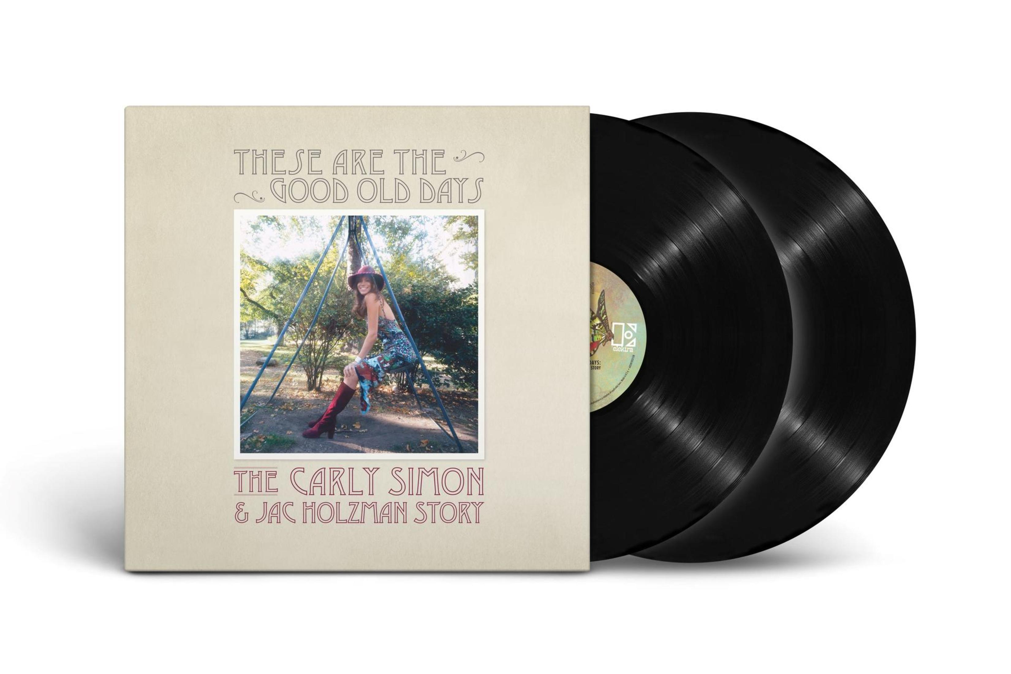Portada de álbum con mujer en columpio, dos discos de vinilo negros.