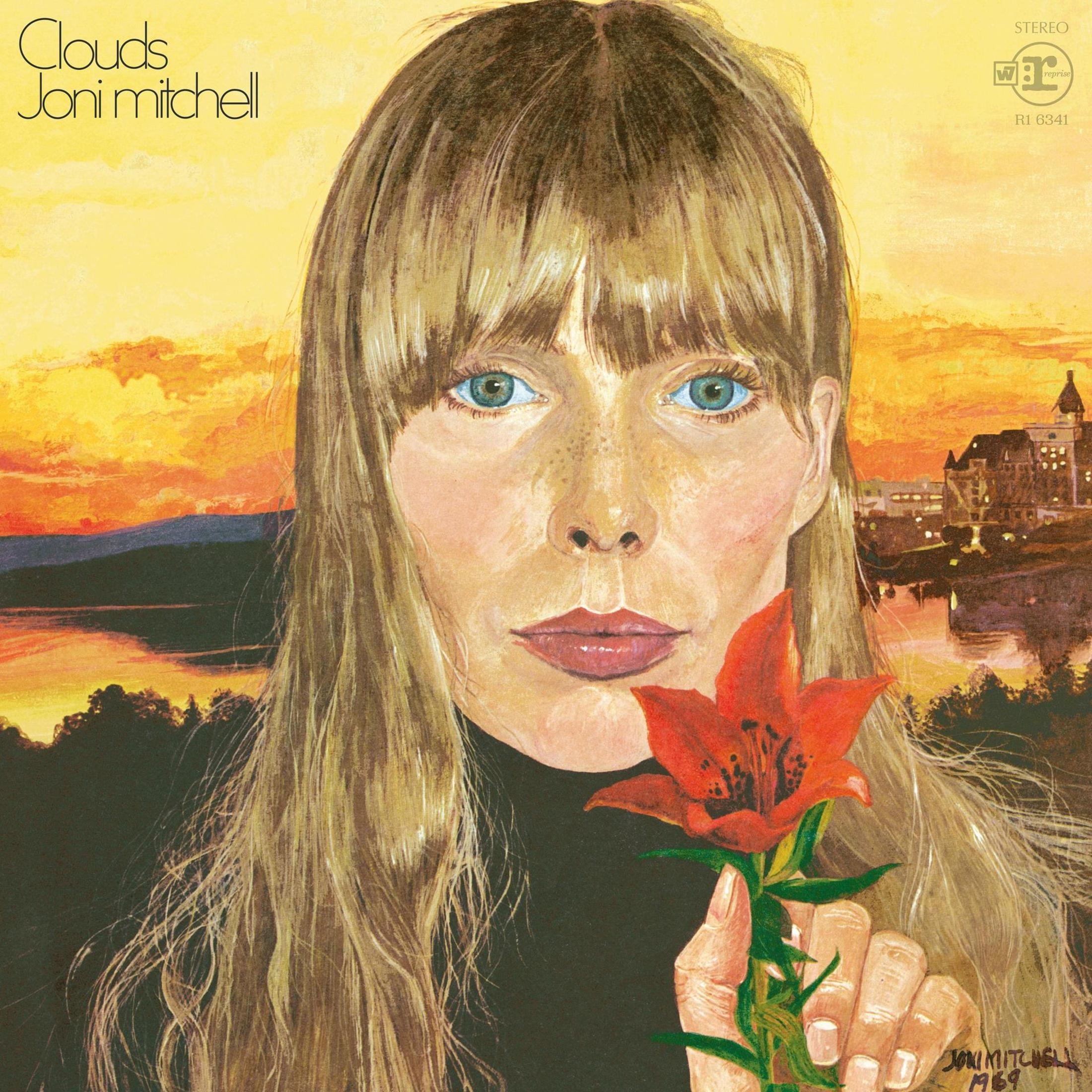 Copertina dell'album di Joni Mitchell. Ritratto con fiore e paesaggio urbano sullo sfondo.