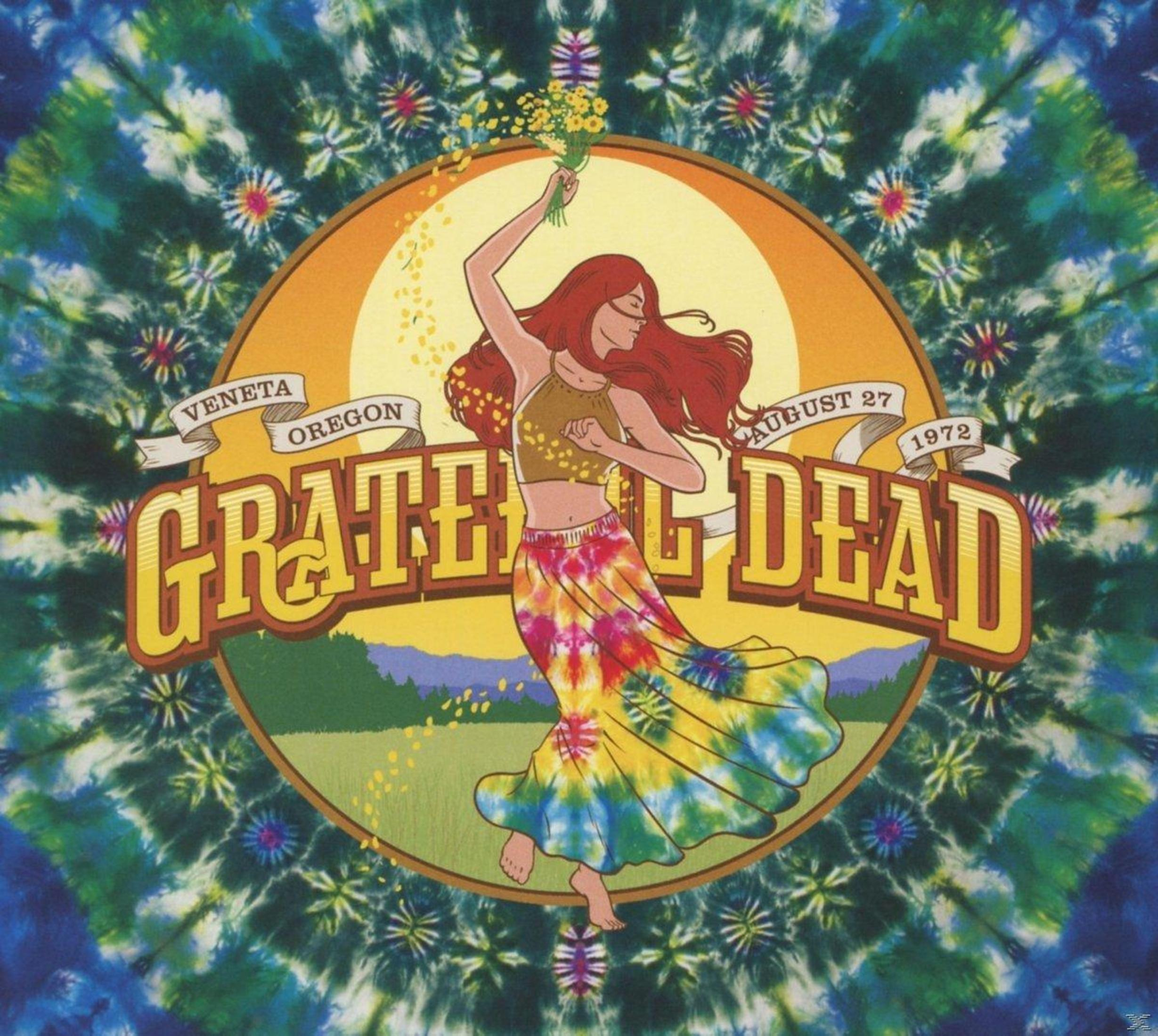 Albumhoes van Grateful Dead. Dansende vrouw met bloemen, tie-dye achtergrond. Bandnaam in het midden.