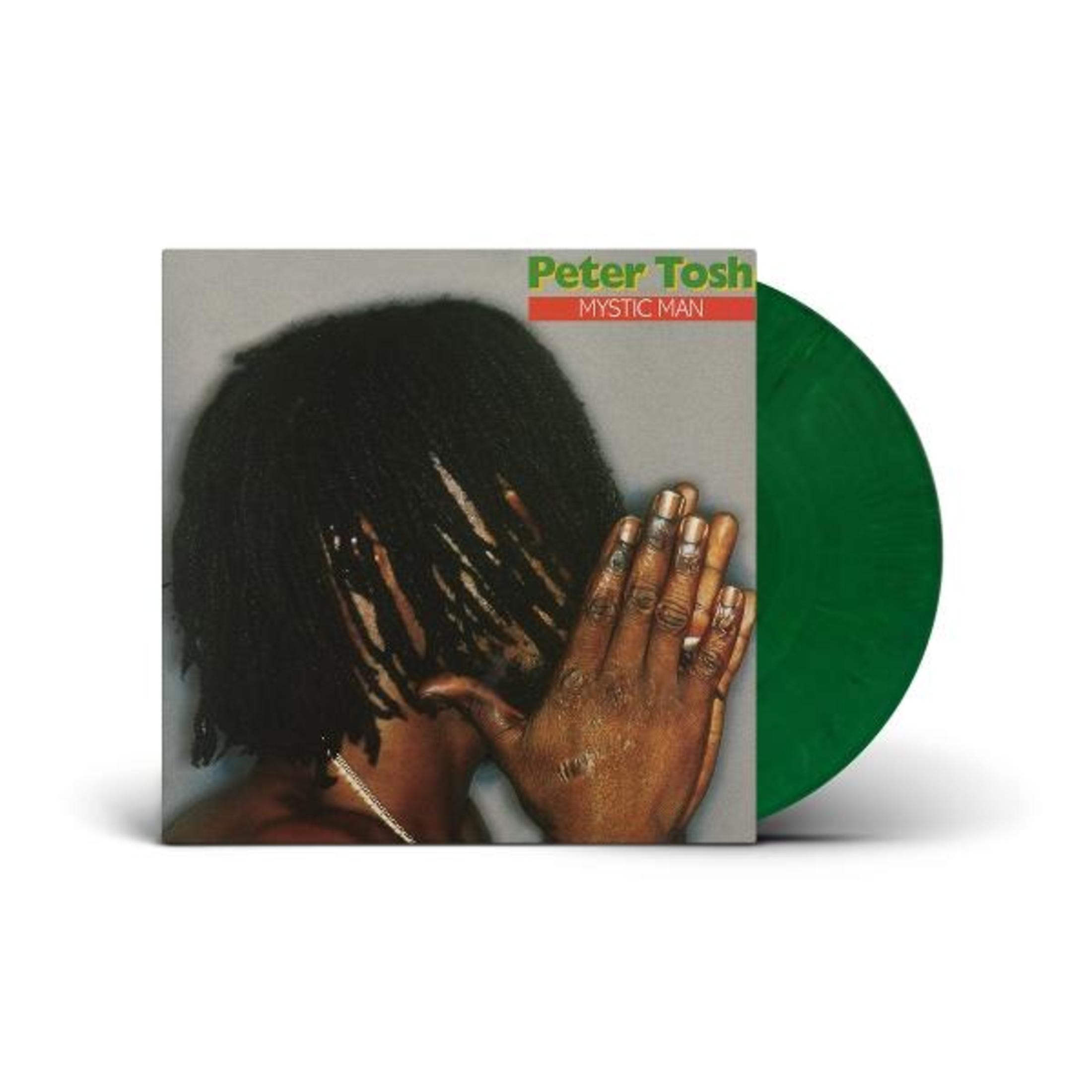 Copertina dell'album: Peter Tosh, capelli neri, mani giunte, album verde.