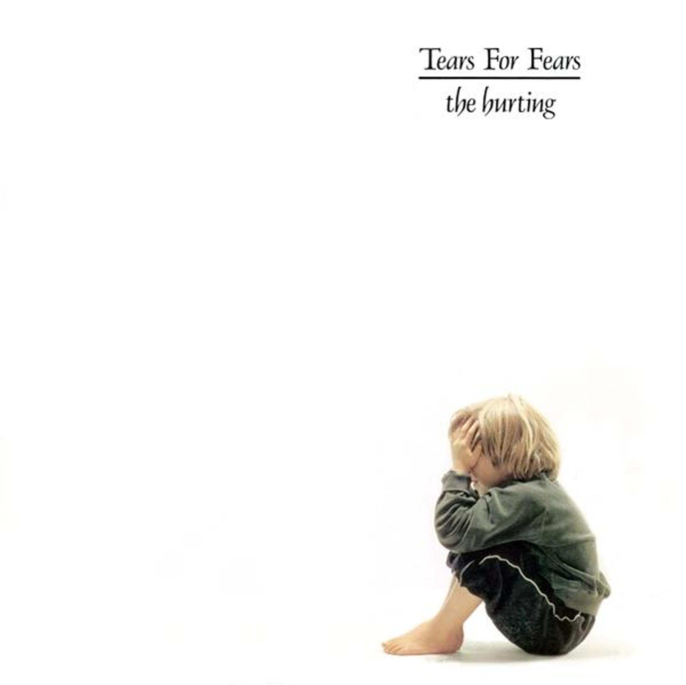 Copertina dell'album: Bambino che si nasconde il viso, sfondo bianco, Tears For Fears.
