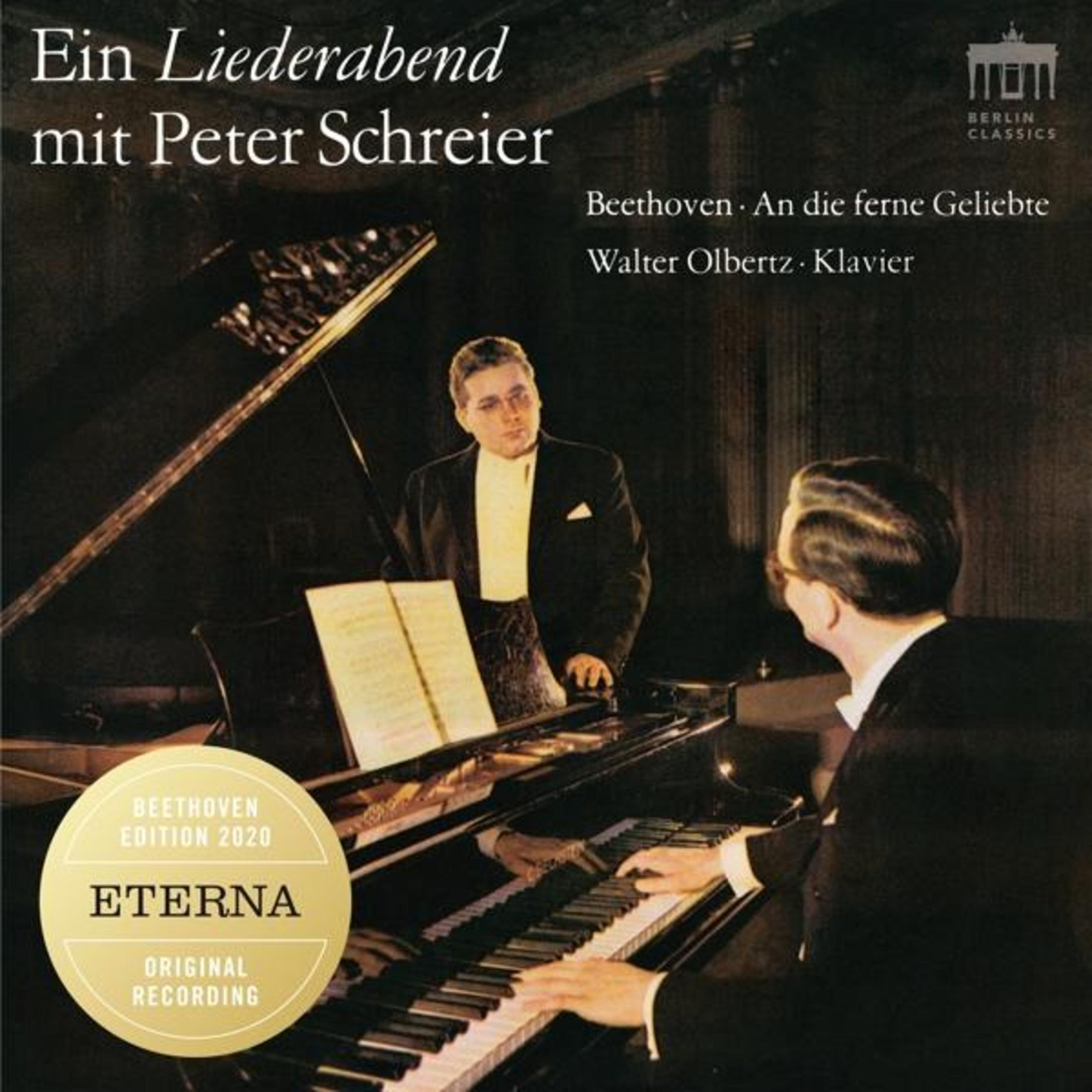 Copertina dell'album. Un uomo suona il pianoforte, un altro uomo in piedi accanto a lui con testo e loghi.