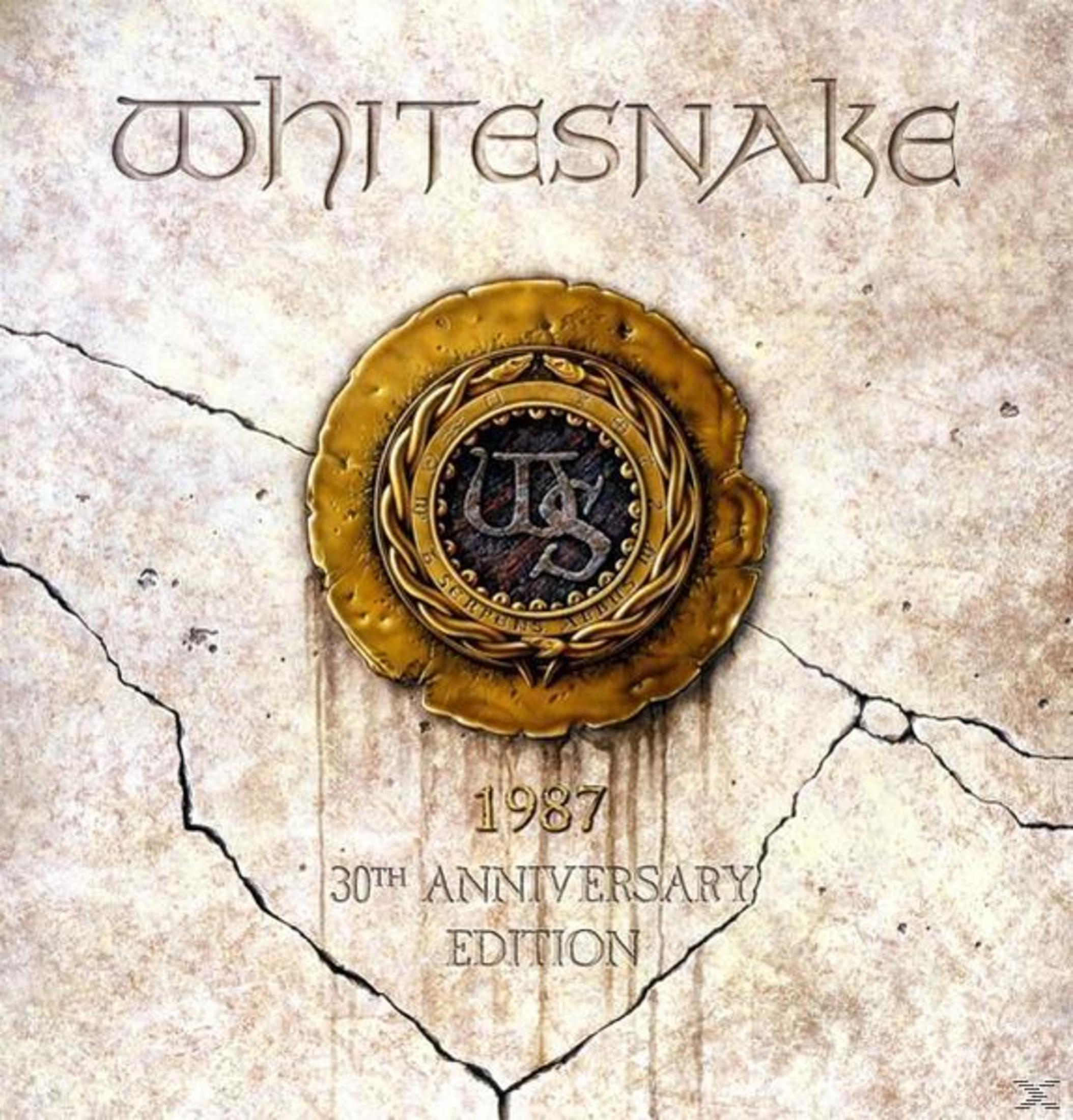 Copertina dell'album Whitesnake con sigillo d'oro e crepe. Testo: "Whitesnake, 1987 30th Anniversary Edition".