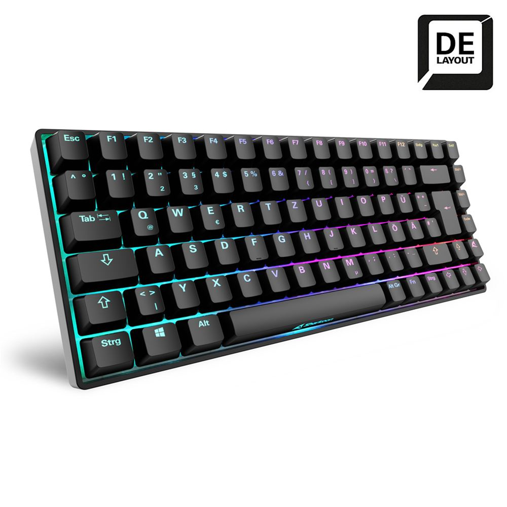 Eine kompakte schwarze Tastatur mit Regenbogenfarben. Das Layout ist Deutsch (DE).