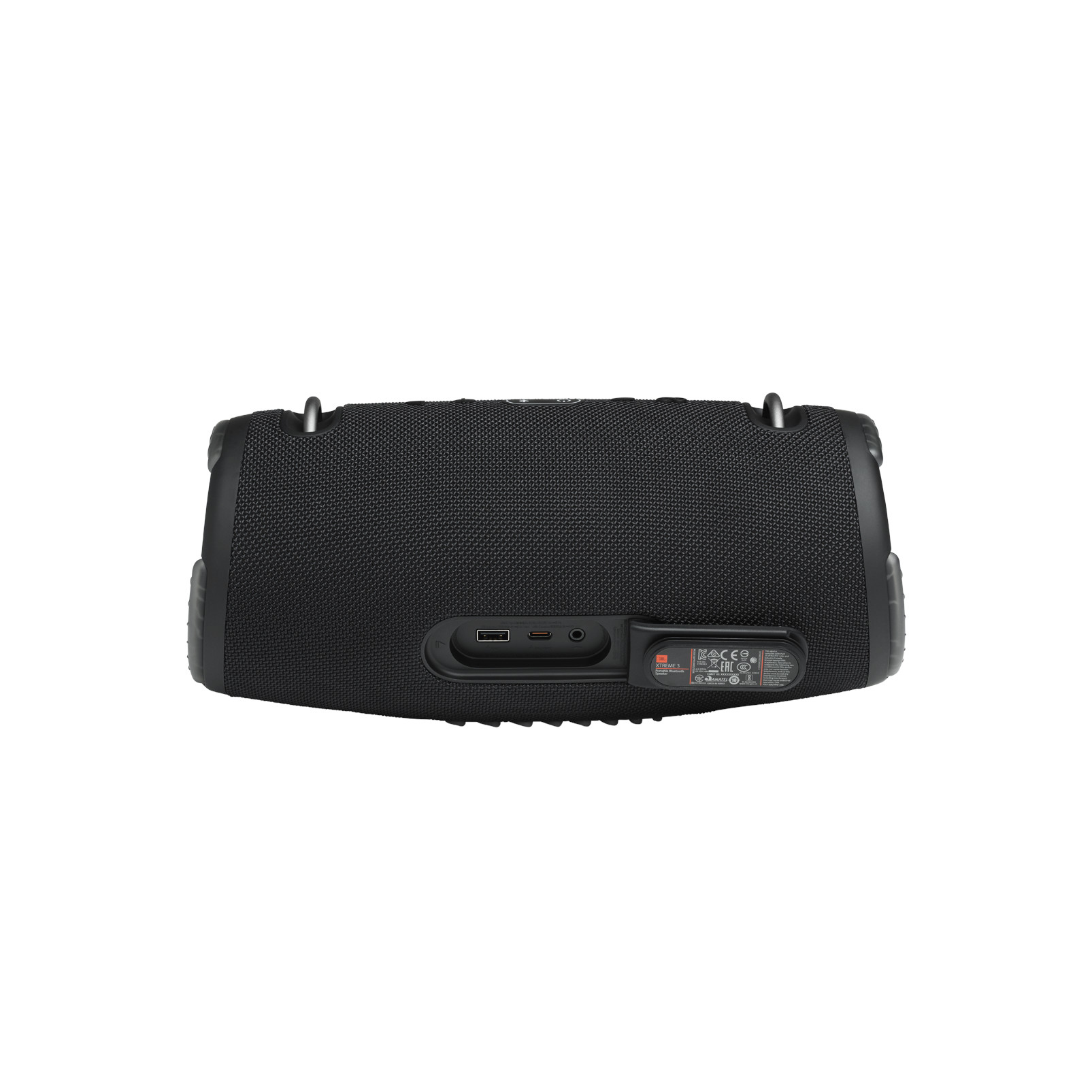 Altavoz JBL negro, vista trasera, con puertos y marca, sobre un fondo blanco.