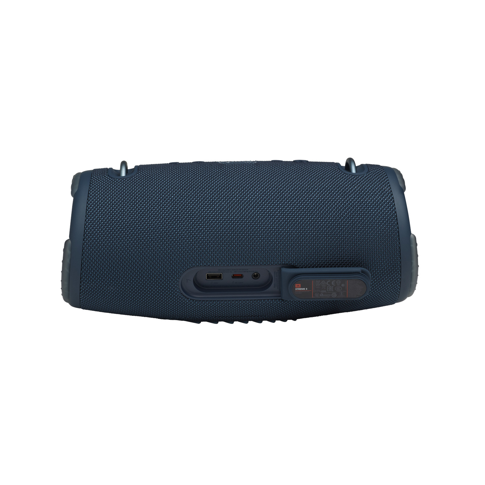 Dunkelblauer JBL-Lautsprecher mit mehreren Anschlüssen und Knöpfen auf der Rückseite, schräge Ansicht.