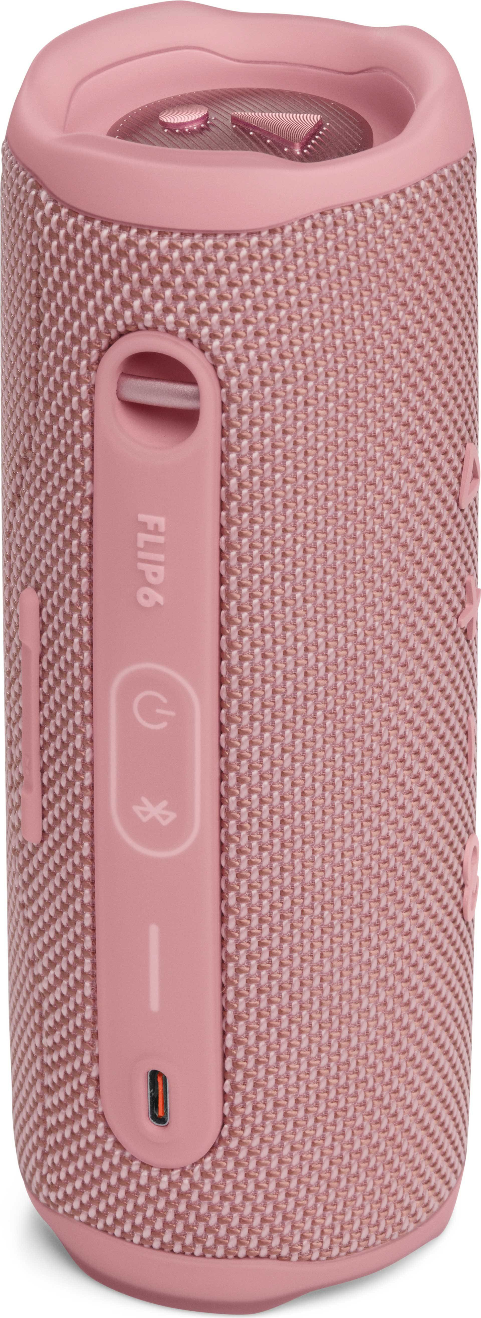 Altavoz JBL Flip 6 rosa, forma cilíndrica, con panel de control y puerto USB-C.