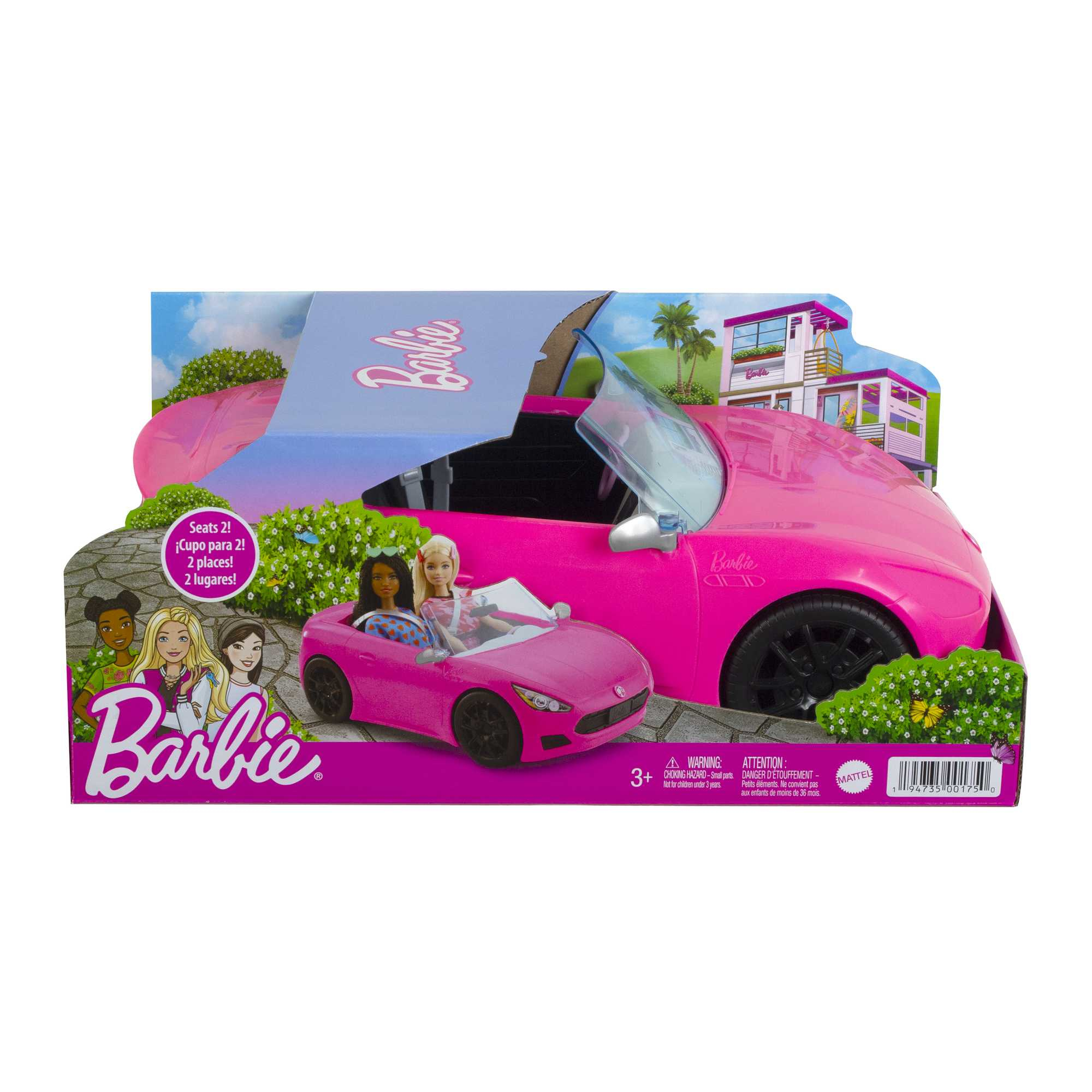 Ein pinkes Barbie-Auto-Spielzeug mit zwei Puppen darin und dem Barbie-Logo in einer Spielzeugkiste.