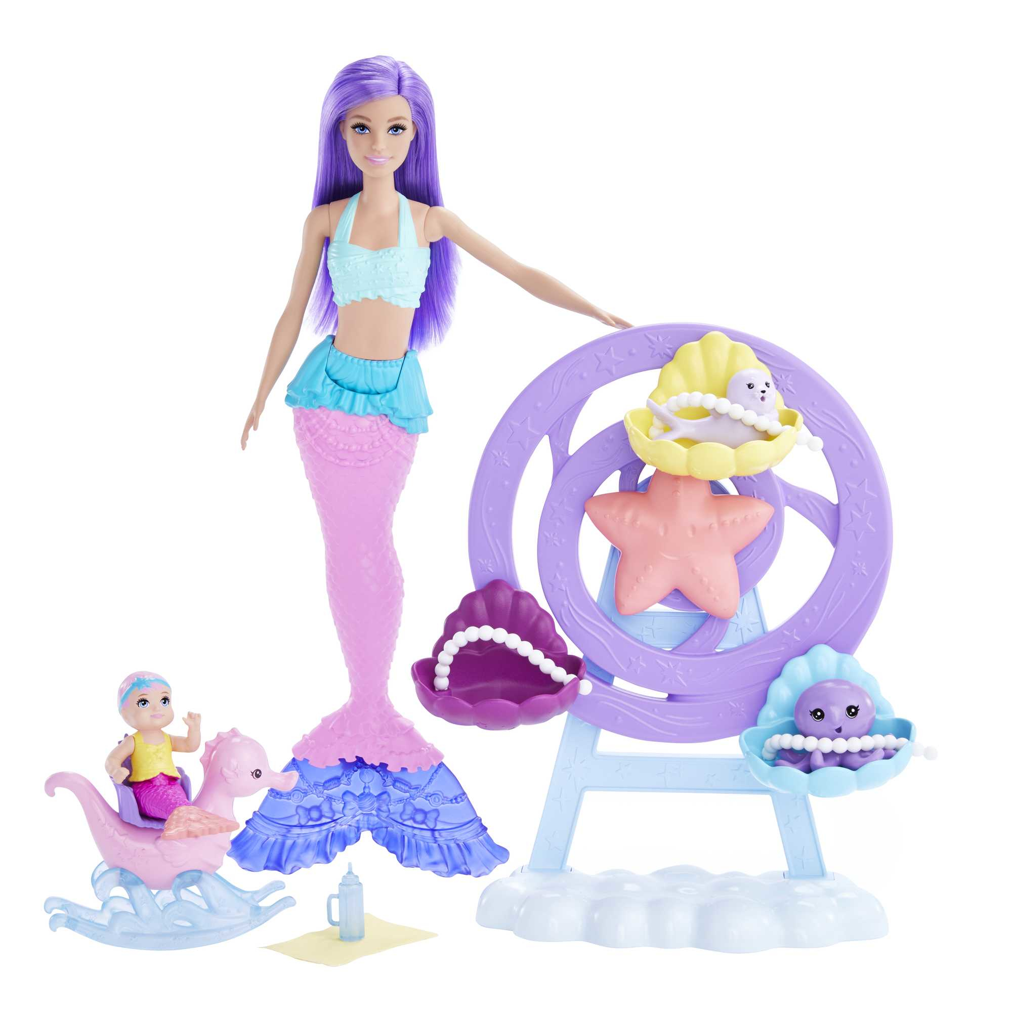Muñeca Barbie sirena con accesorios. Incluye una sirena, una muñeca pequeña y una noria.