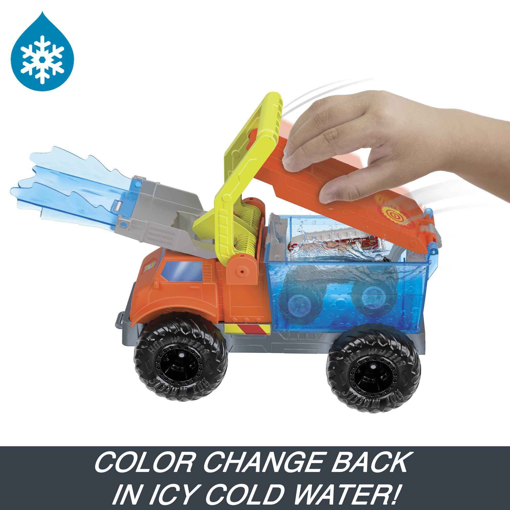 Pomarańczowa i niebieska zabawka ciężarówka z ręką aktywującą funkcję. Tekst mówi: 'ZMIANA KOLORU Z POWROTEM W LODOWATEJ ZIMNEJ WODZIE!'.