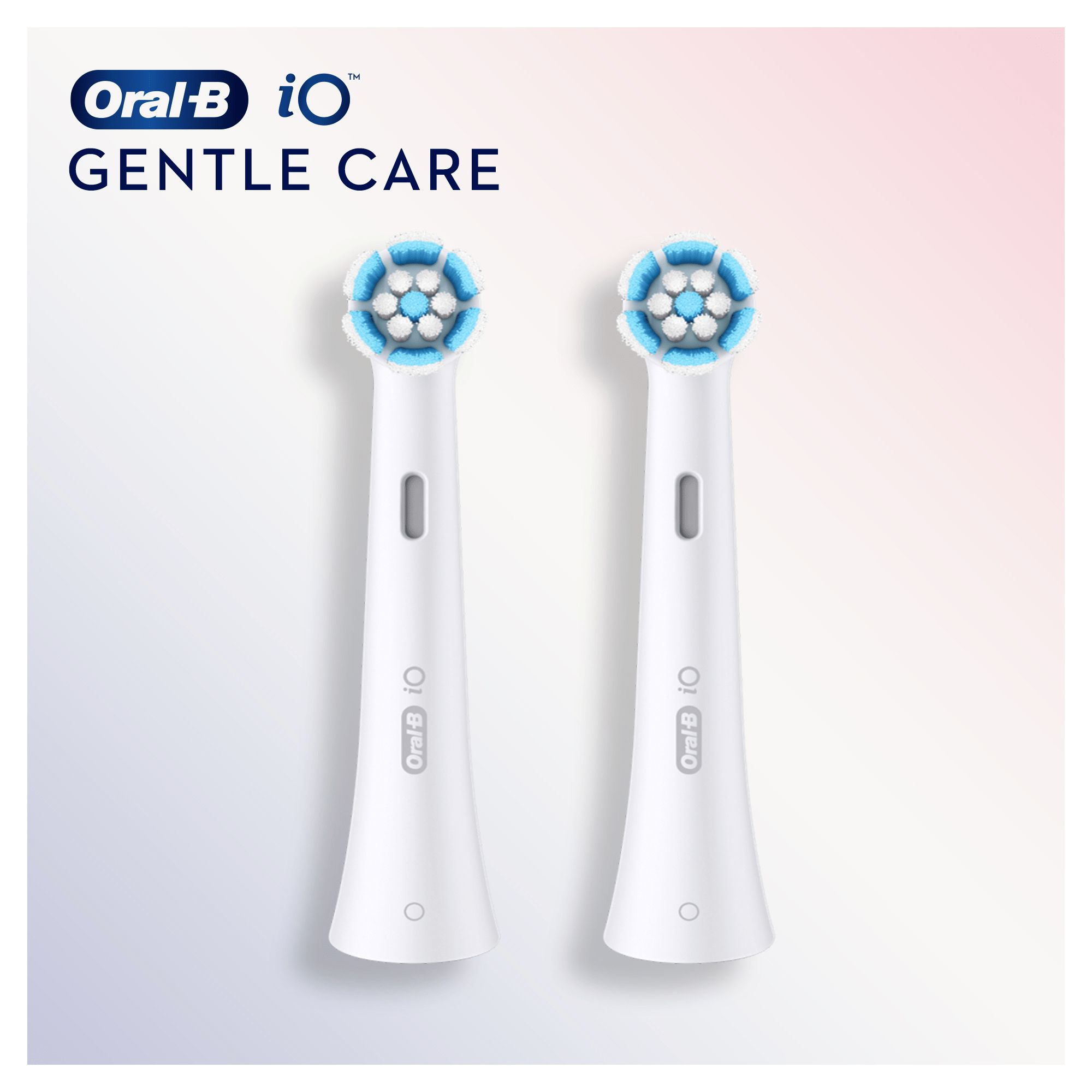 Zwei weiße Oral-B iO-Bürstenköpfe mit blau-weißen Borsten vor pink-weißem Hintergrund.