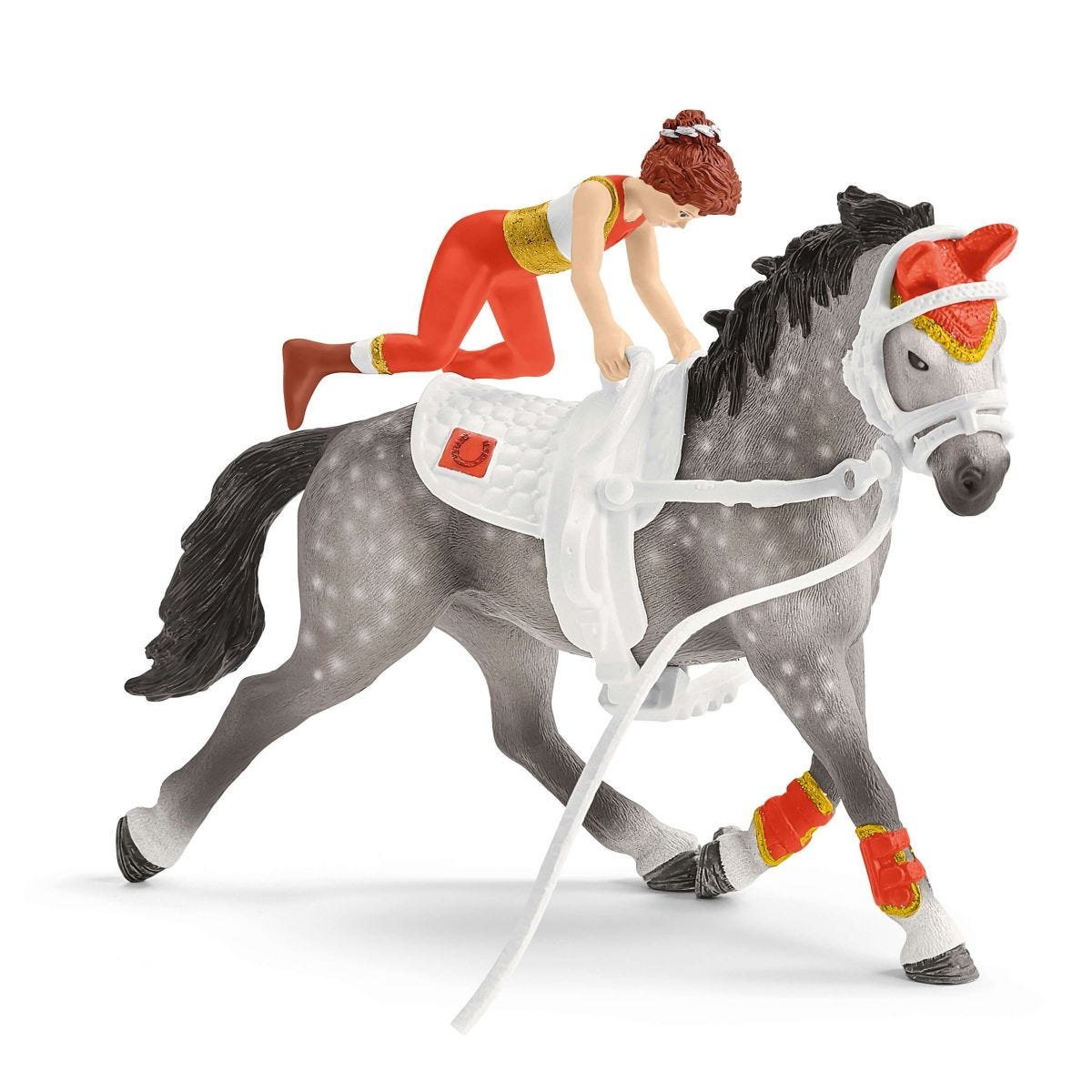 Ein Spielzeugpferd mit Reiter, das Pferd ist grau und der Reiter trägt rote und gelbe Kleidung.