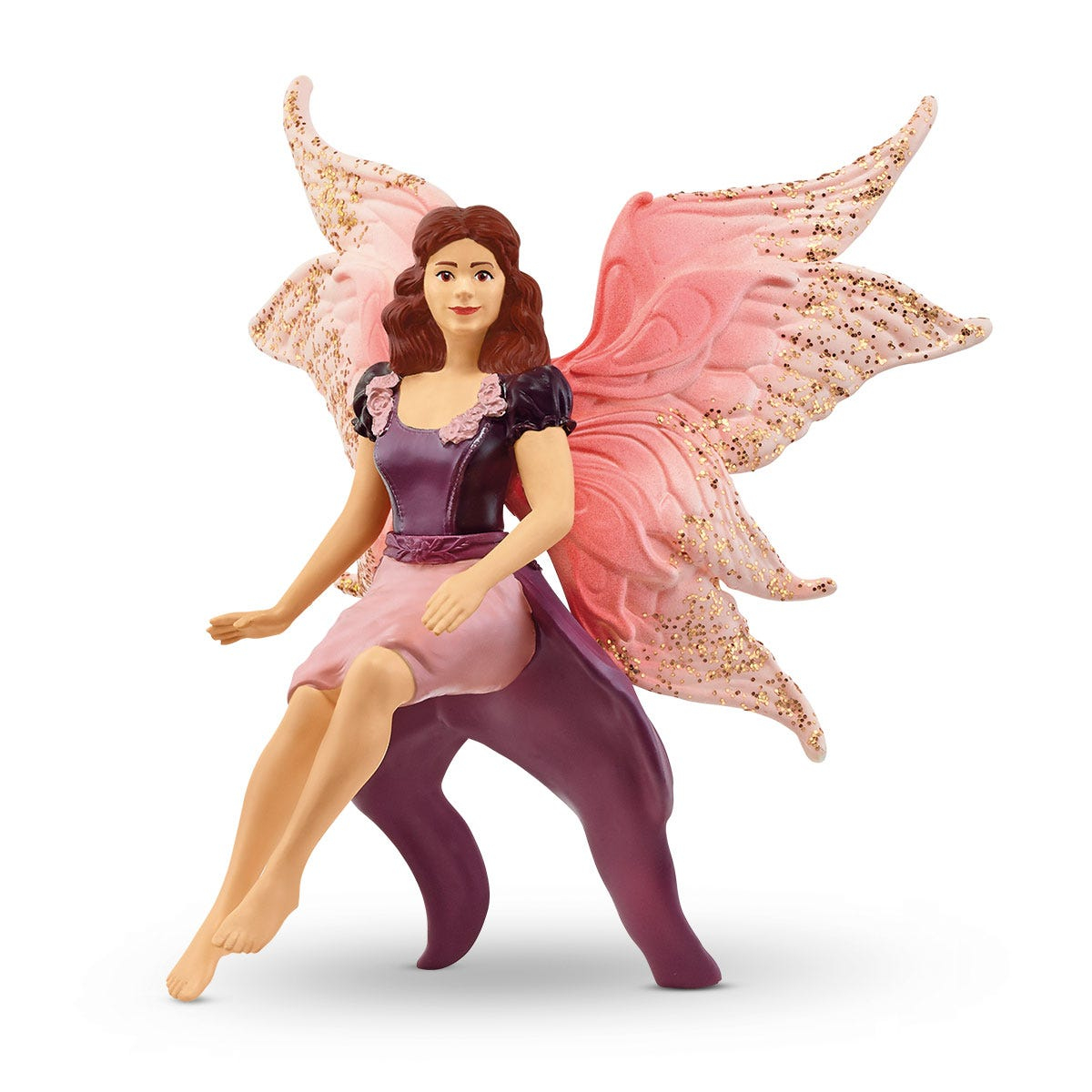 Eine Feenfigur mit rosa Flügeln, einem lila Rock und braunem Haar, die auf einem lila Sockel sitzt.