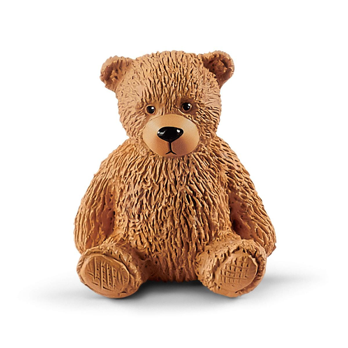 Braune Teddybär-Figur, sitzend mit detaillierter Fellstruktur.