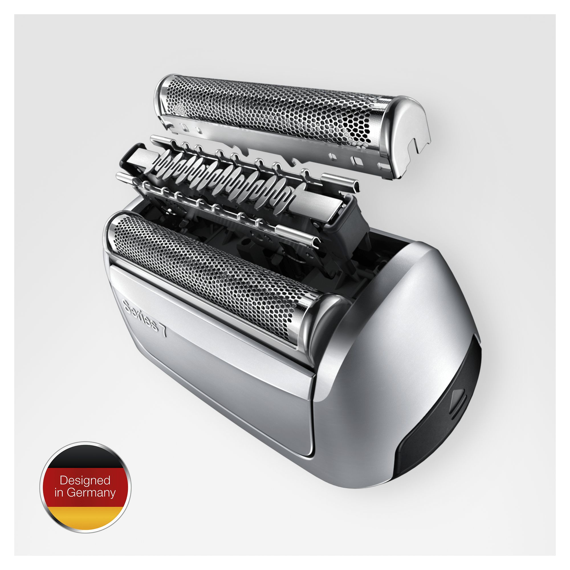 Rasoir démonté, avec le logo 'Conçu en Allemagne'.