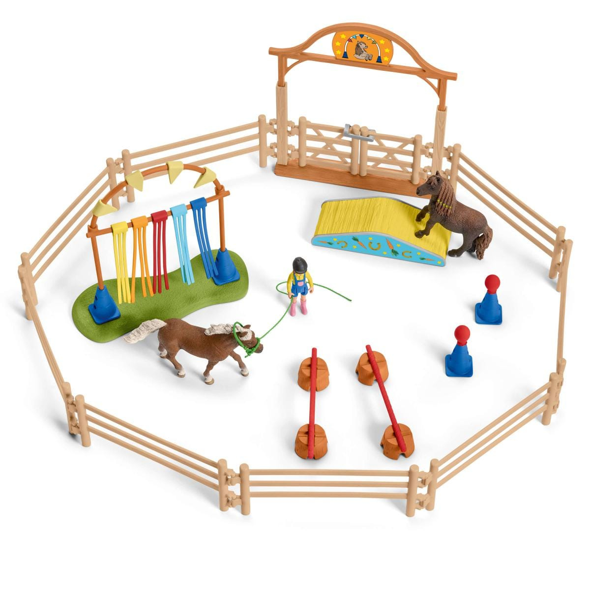 Un set di giocattoli per l'equitazione. Il set include cavalli, una recinzione e un percorso di allenamento.