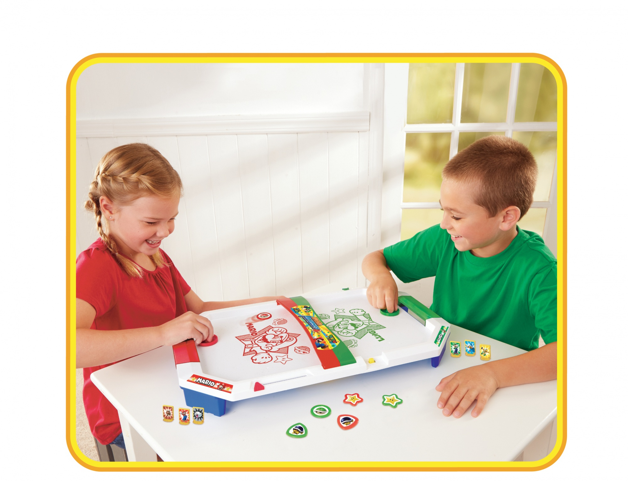 Two children play a Super Mario board game. The game is on a white table.