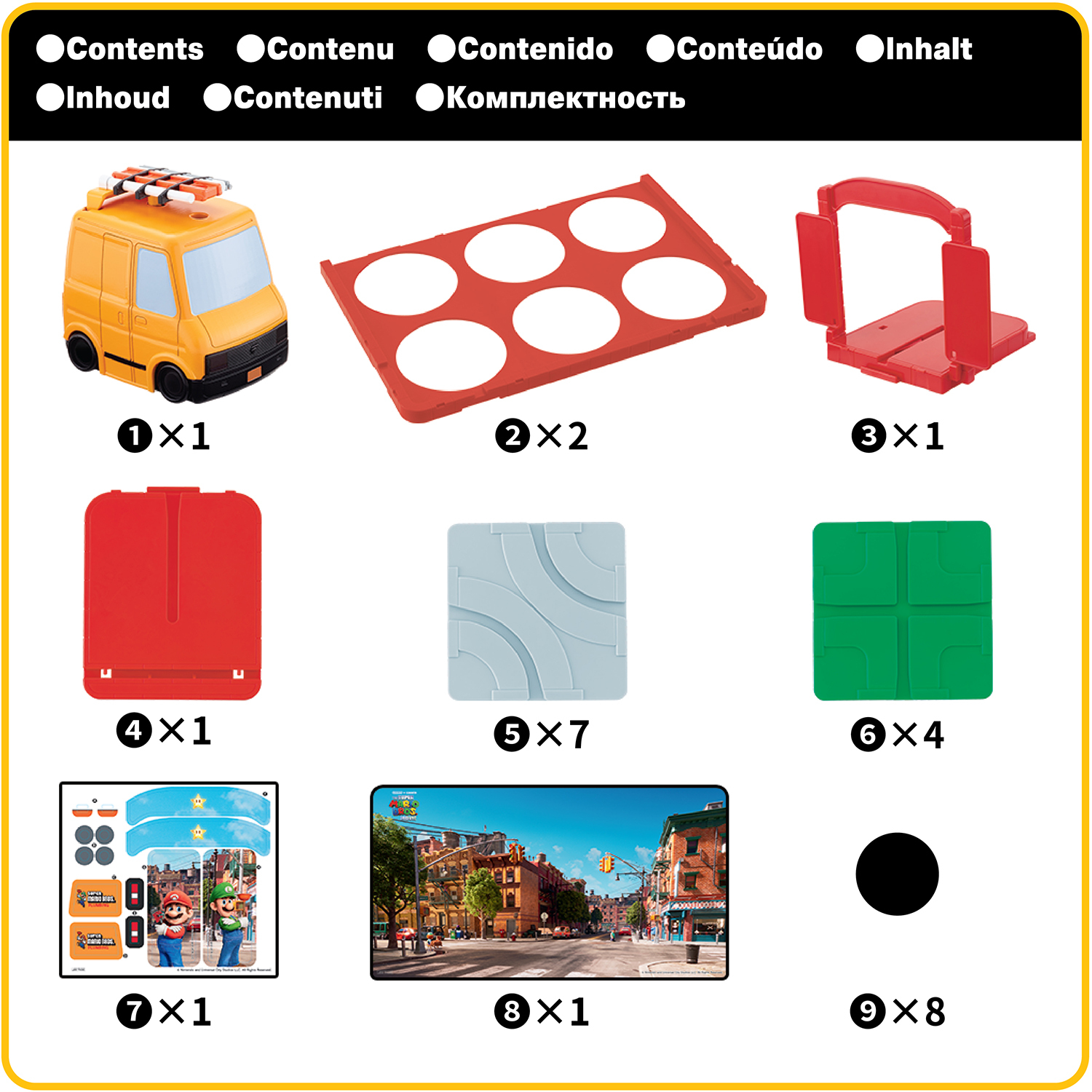 Różne części zabawek do zestawu do zabawy, w tym żółty van, czerwone płyty i zielone klocki.