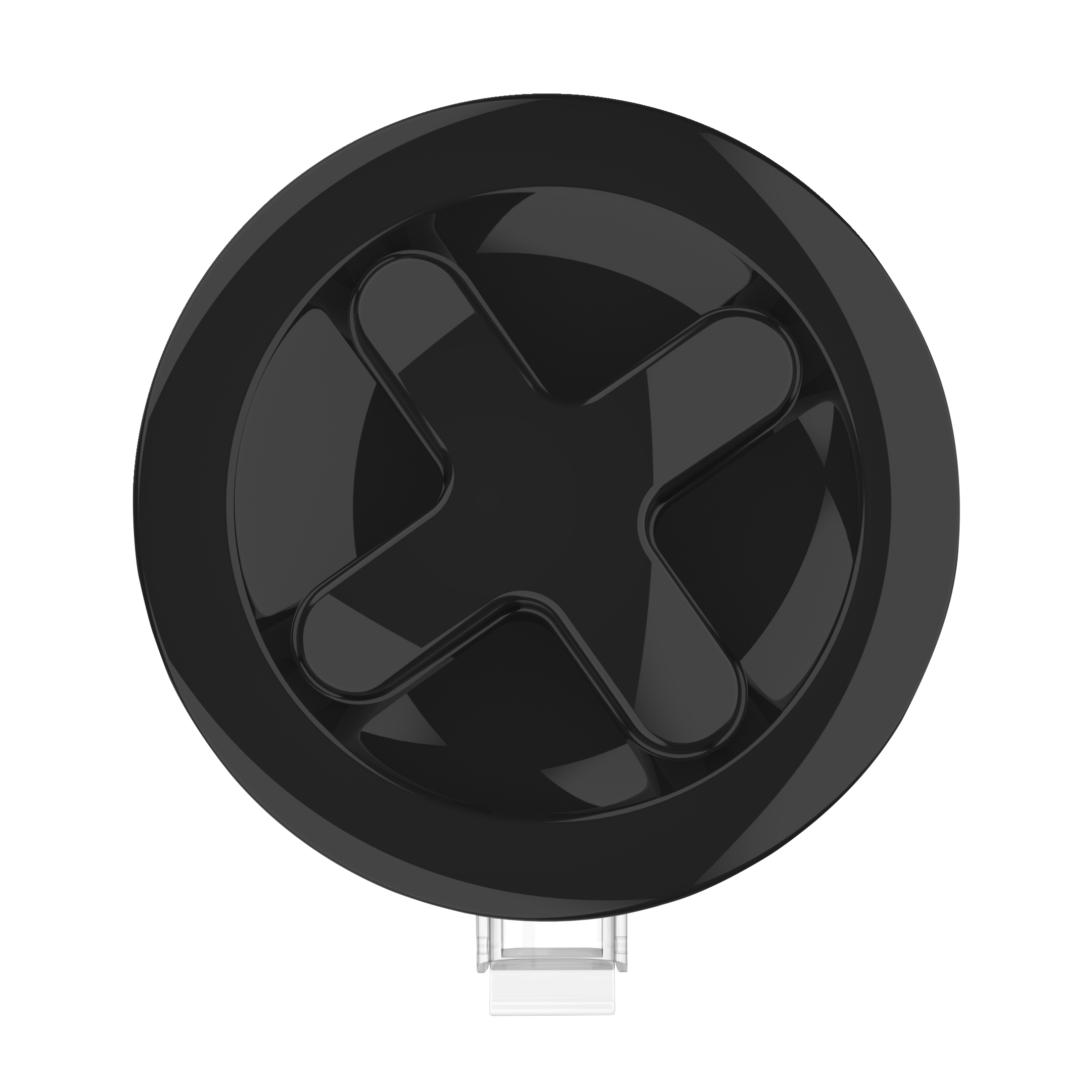 Un pulsante nero con un grande design a X al centro. È su una superficie bianca.