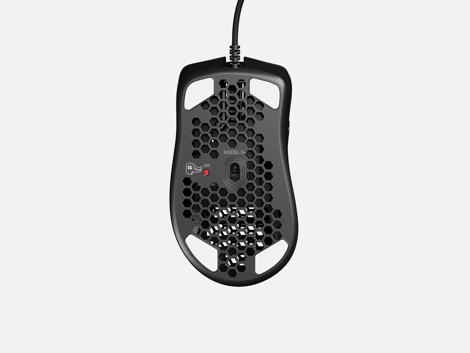 Souris gaming noire avec un design en nid d'abeilles.