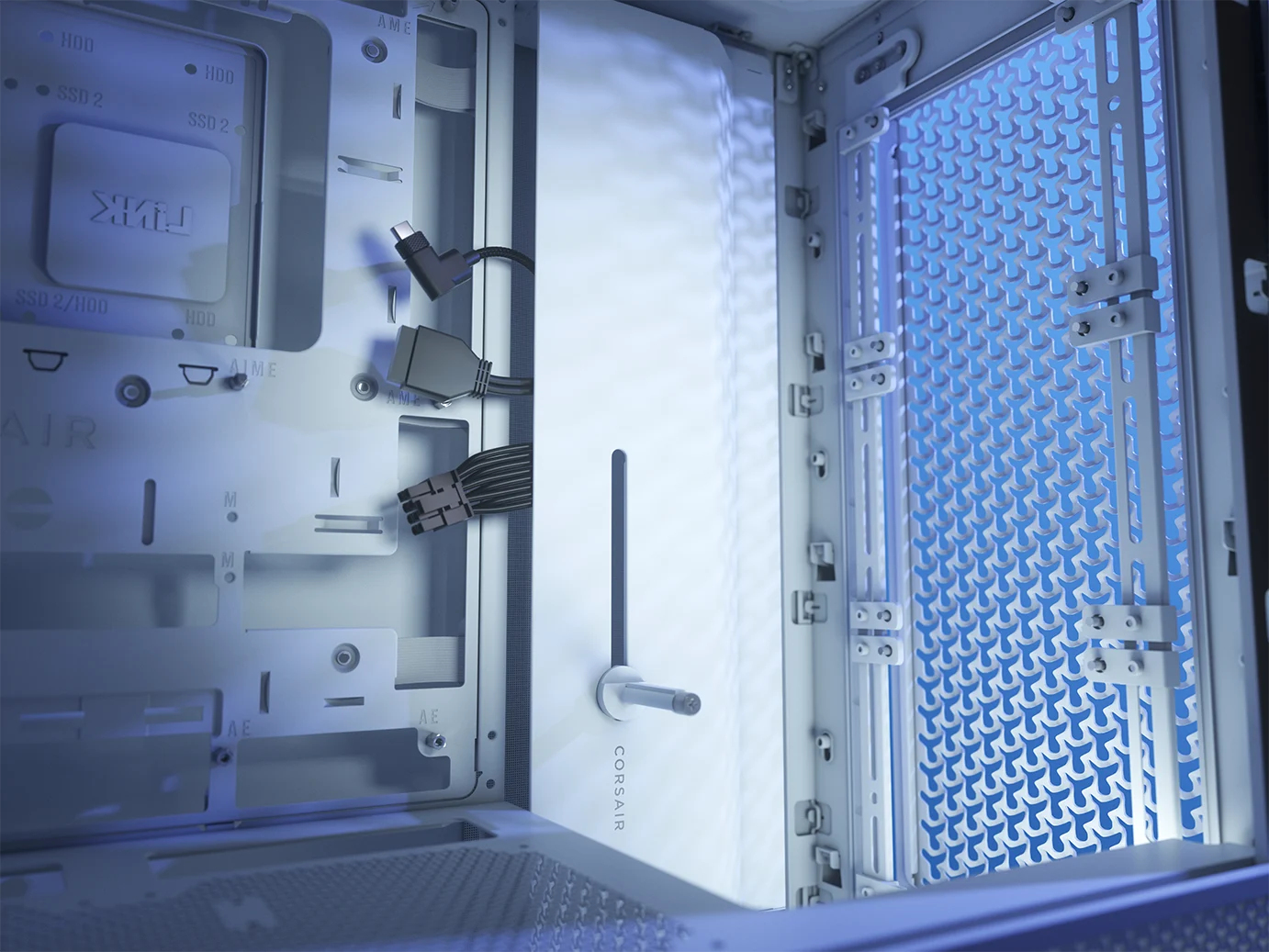 Wnętrze obudowy komputera, pokazujące zarządzanie kablami i strukturę montażową.