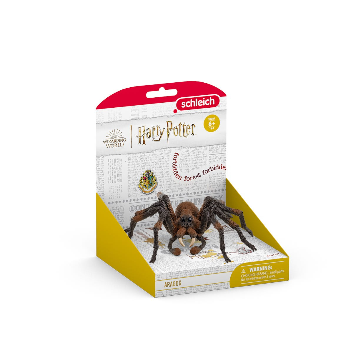 Zabawkowy pająk w pudełku. Na pudełku napisane jest 'Harry Potter' i 'Aragog'.