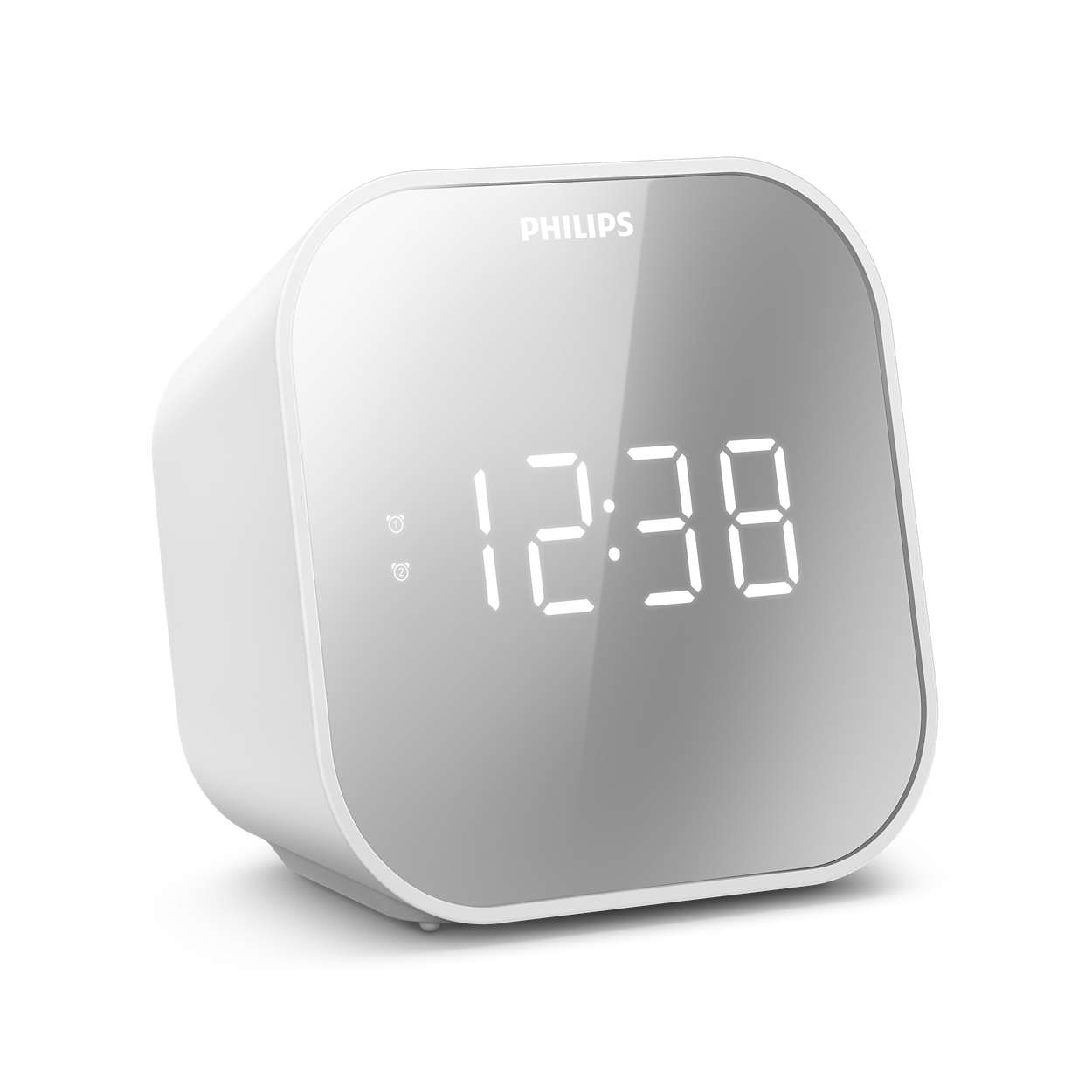 Despertador Philips blanco mostrando 12:38 en una pantalla tipo espejo, sobre fondo blanco.