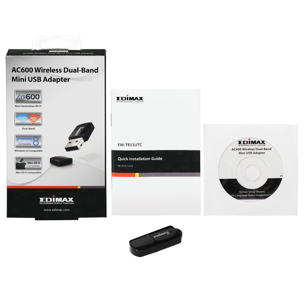 Box set: Wireless USB adapter, instructions, CD. Black adapter. White background. Edimax brand.