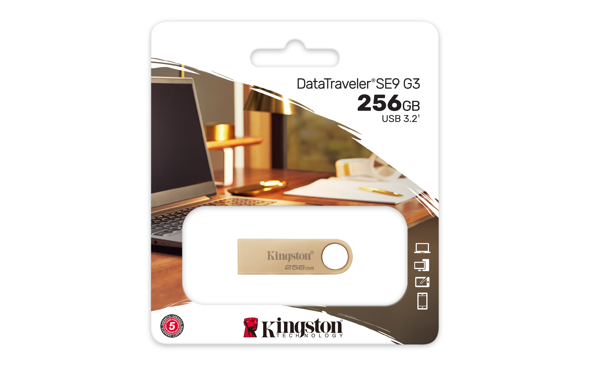 Dysk USB Kingston DataTraveler w opakowaniu. Laptop i kilka papierów w tle.