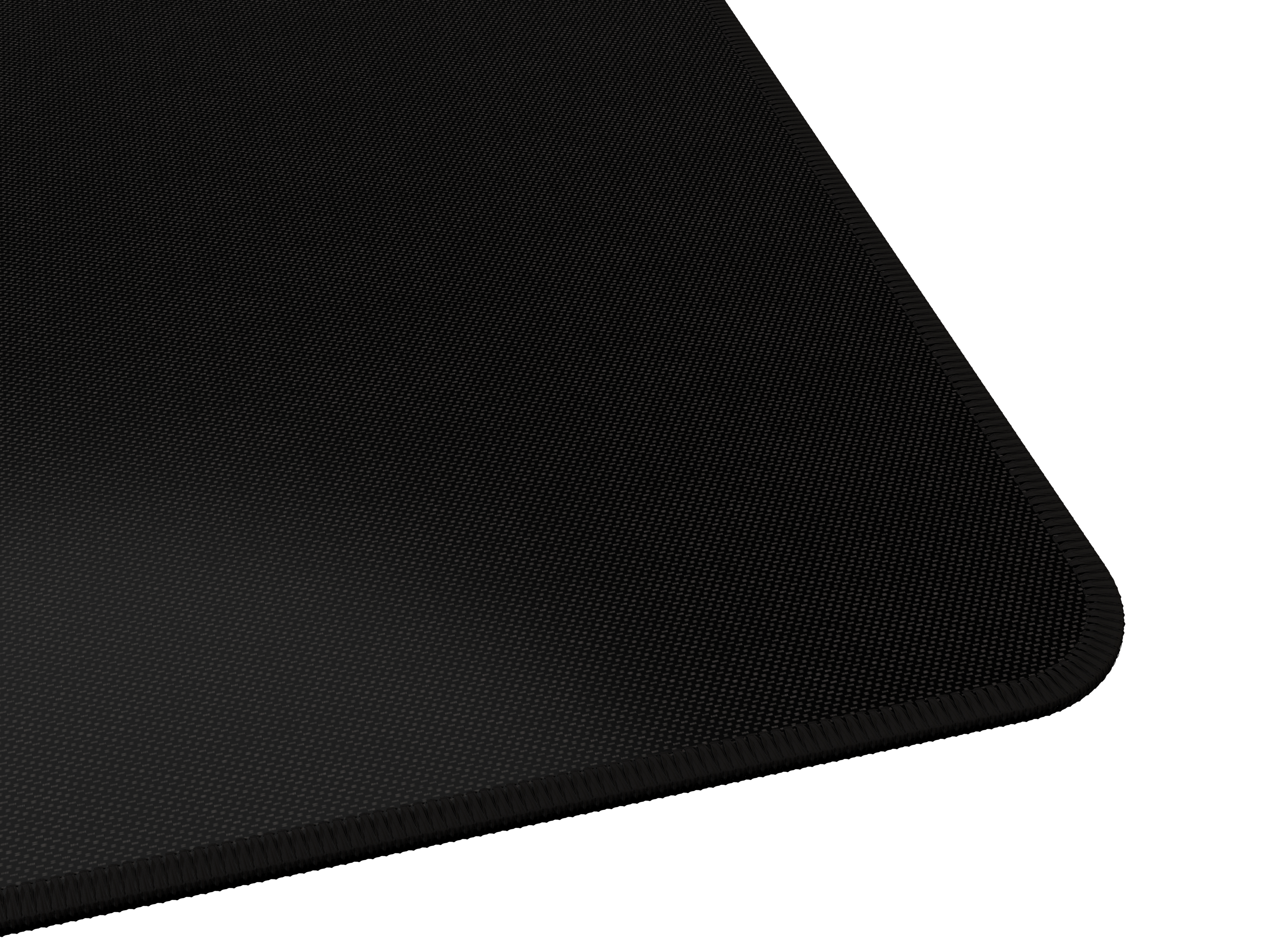 Gros plan sur le coin d'un tapis de souris noir, avec une surface texturée.