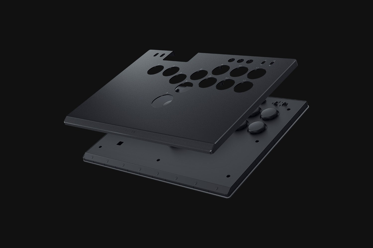 Schwarzer Arcade-Stick mit Löchern für Knöpfe und einem Joystick.