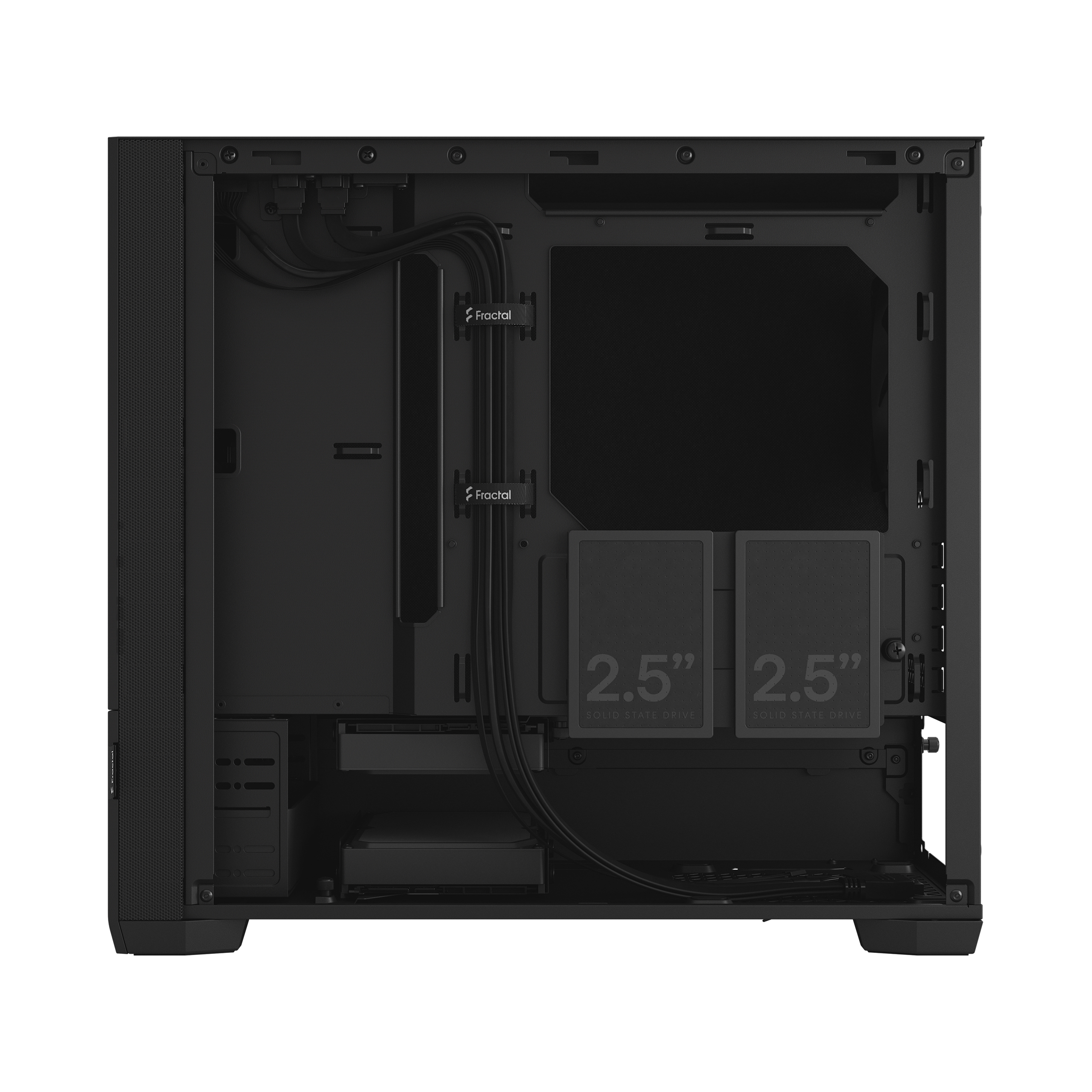 Inside of a black computer case, showing internal components and cable management.