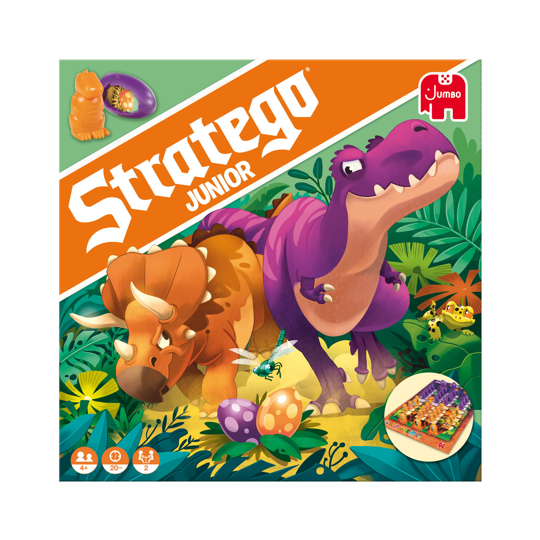 Une boîte de jeu de société Stratego Junior avec des dinosaures et des pièces. Le fond est vert.